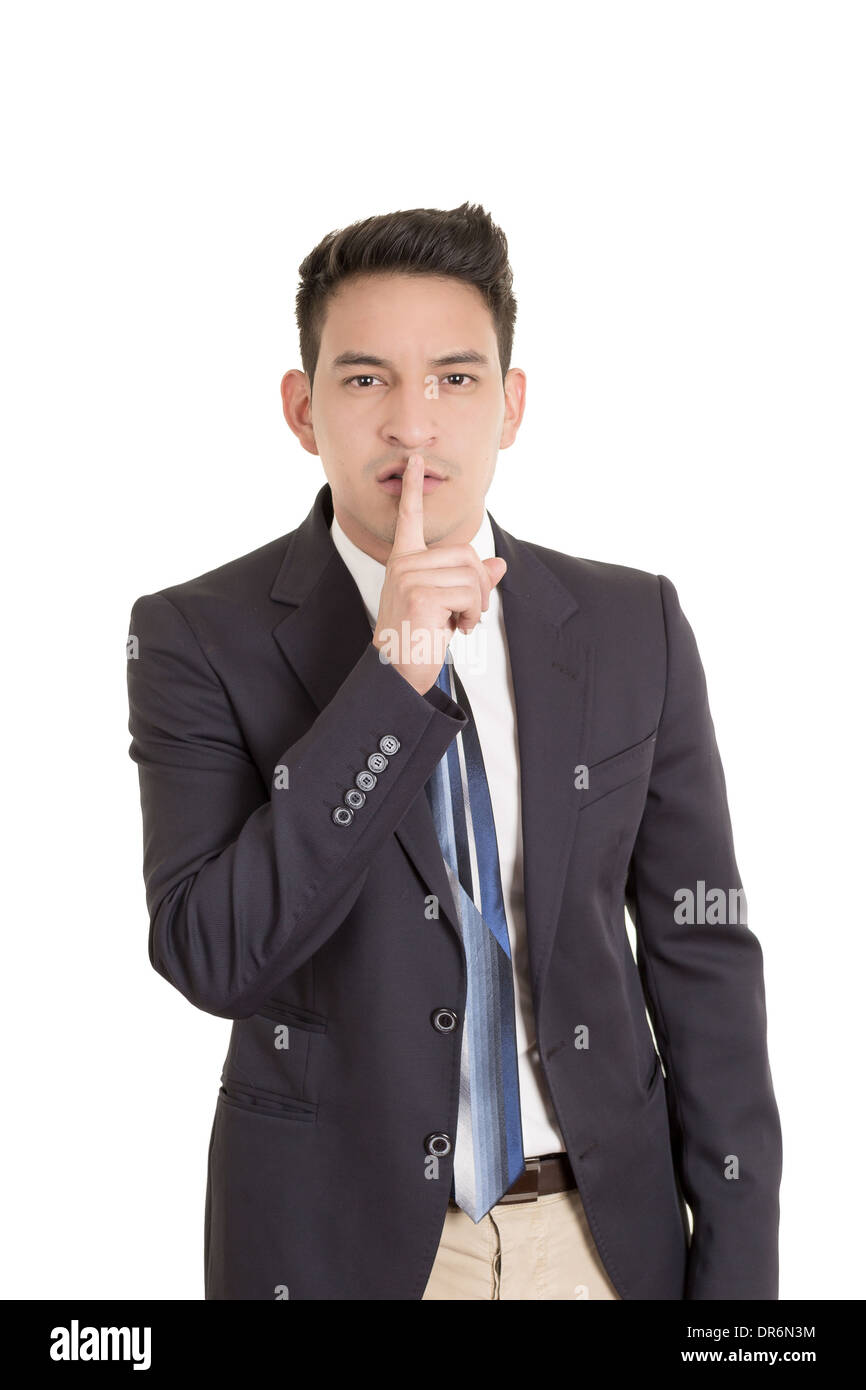 Hispano-Amerikaner Geschäftsmann, Finger auf die Lippen, shh Stockfoto