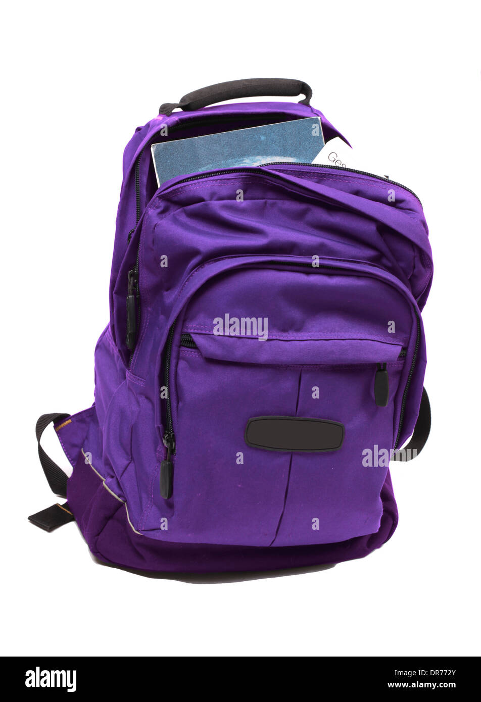Lila Rucksack voll mit Schulbüchern Stockfoto