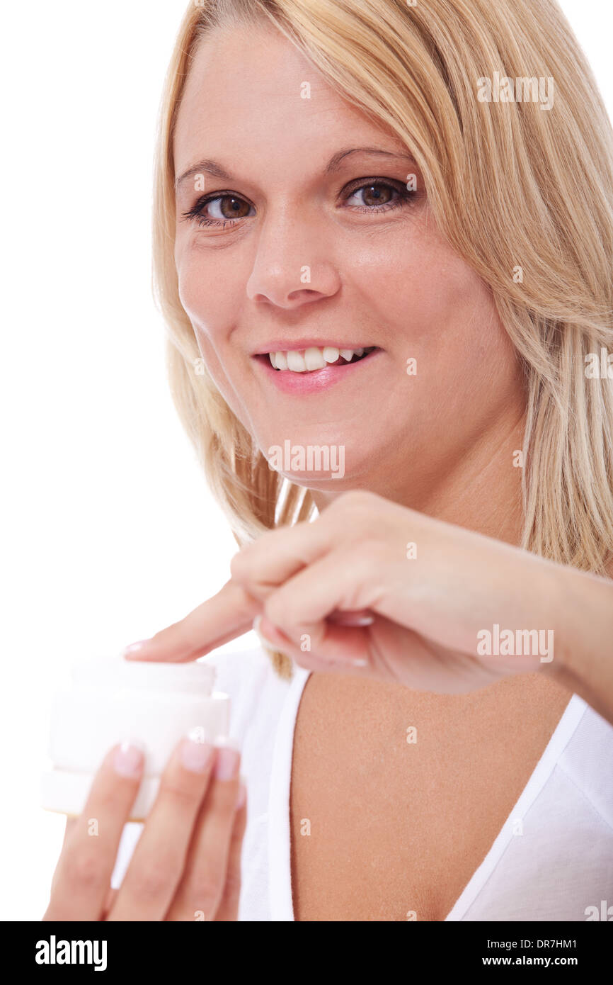 Attraktive Frau mit Körperlotion. Alle auf weißem Hintergrund. Stockfoto