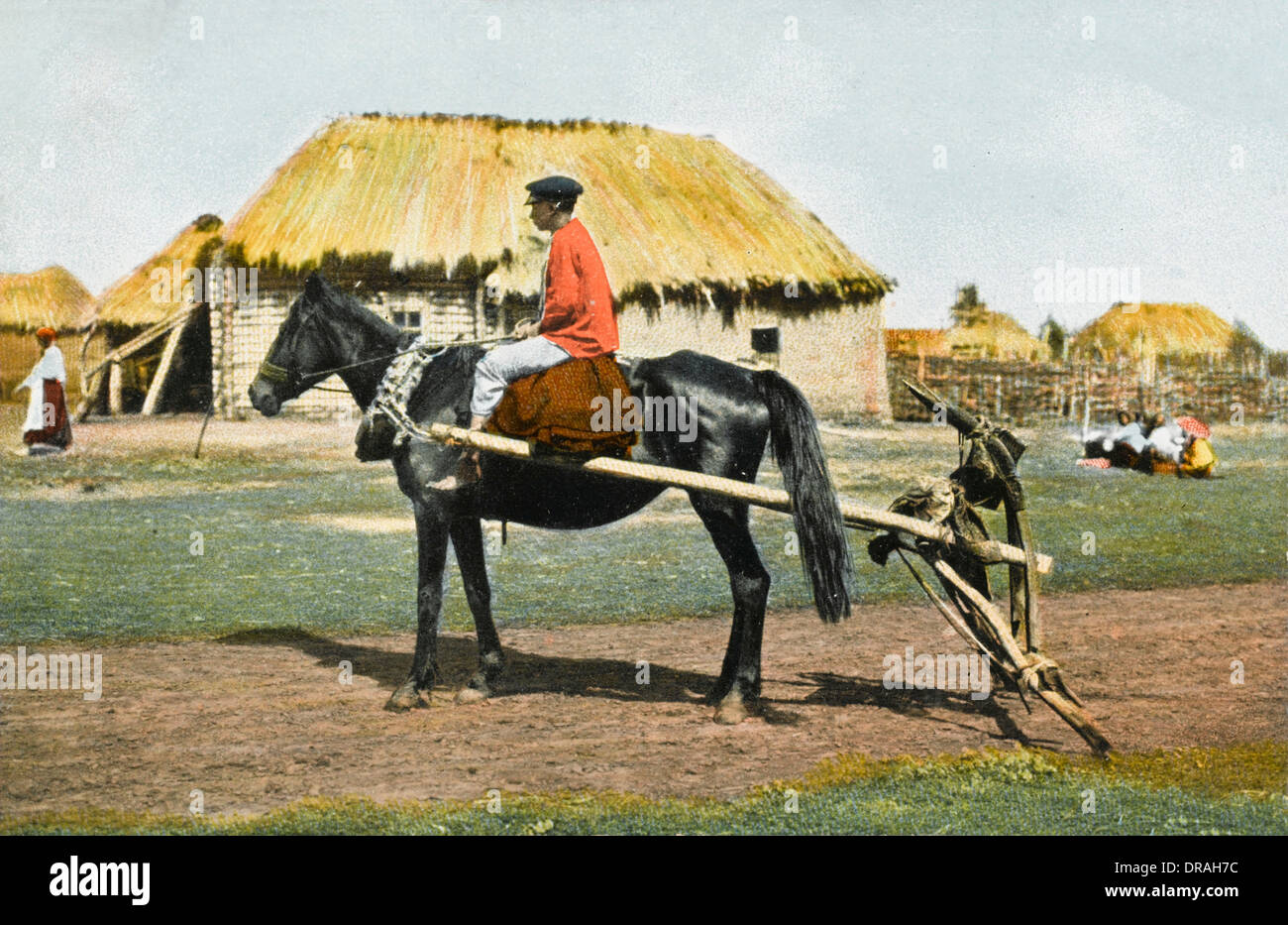 Russische Landarbeiter auf einem Pferd Stockfoto
