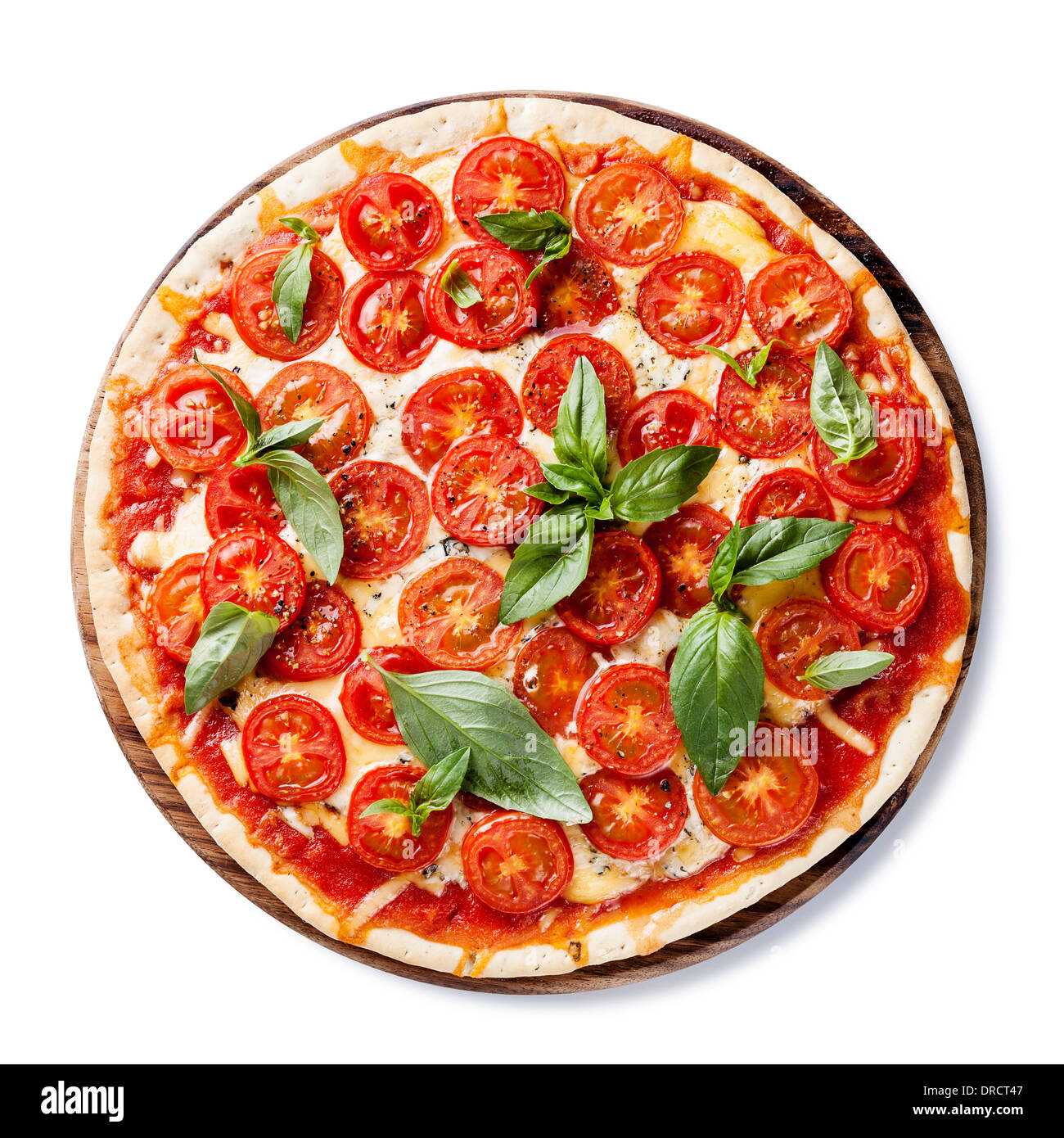 Italienische Pizza mit Cherry-Tomaten und grüne Basilikum auf weißem Hintergrund Stockfoto