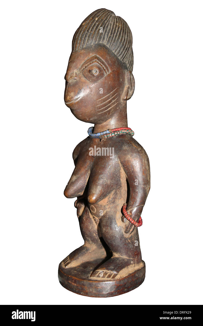 Nigerianische Ibeji Figur - geschnitzte Holzfigur unternommen, um die Seele des toten Zwilling Haus Stockfoto