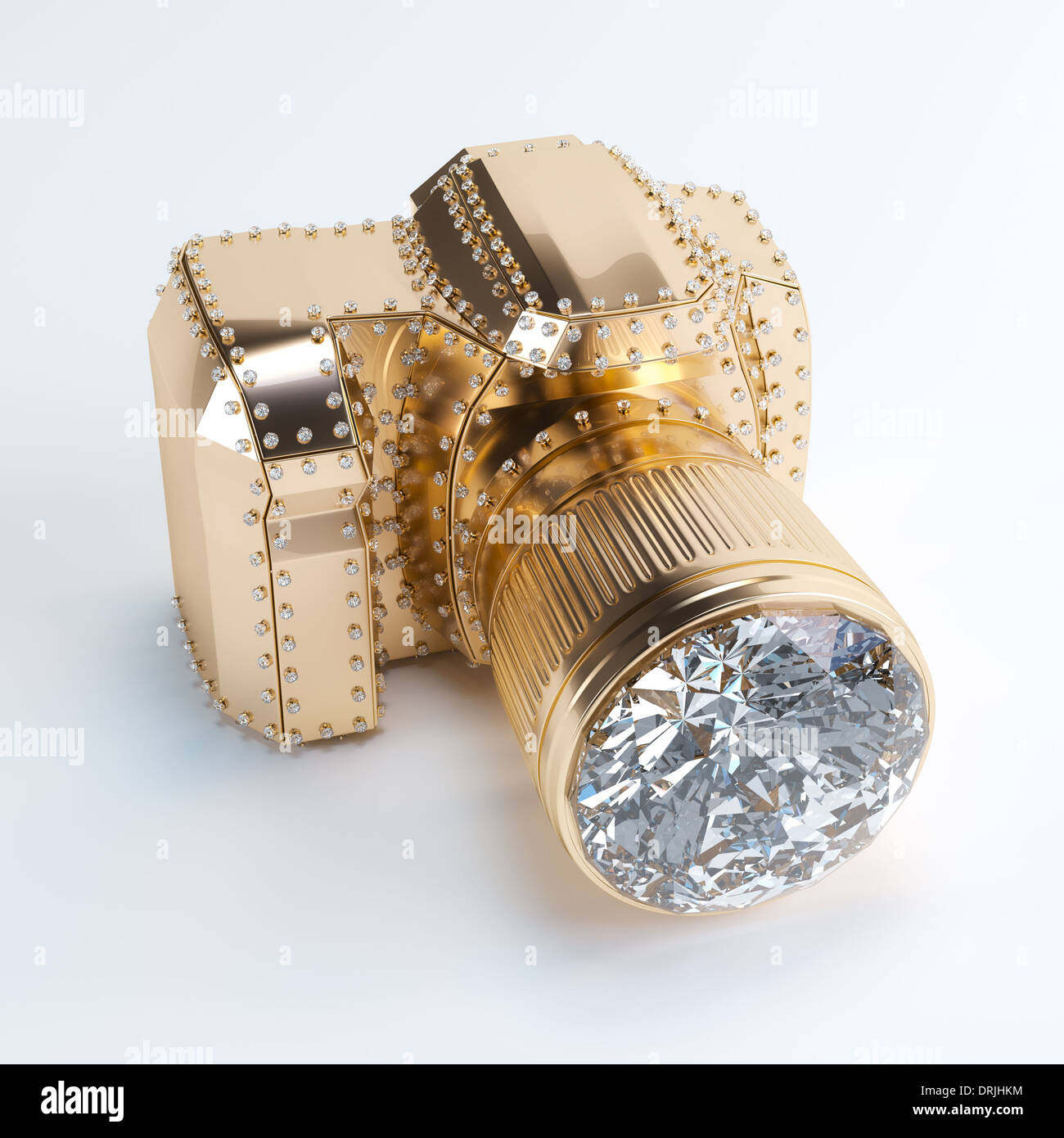 Goldene Kamera mit Diamant-Objektiv Stockfoto