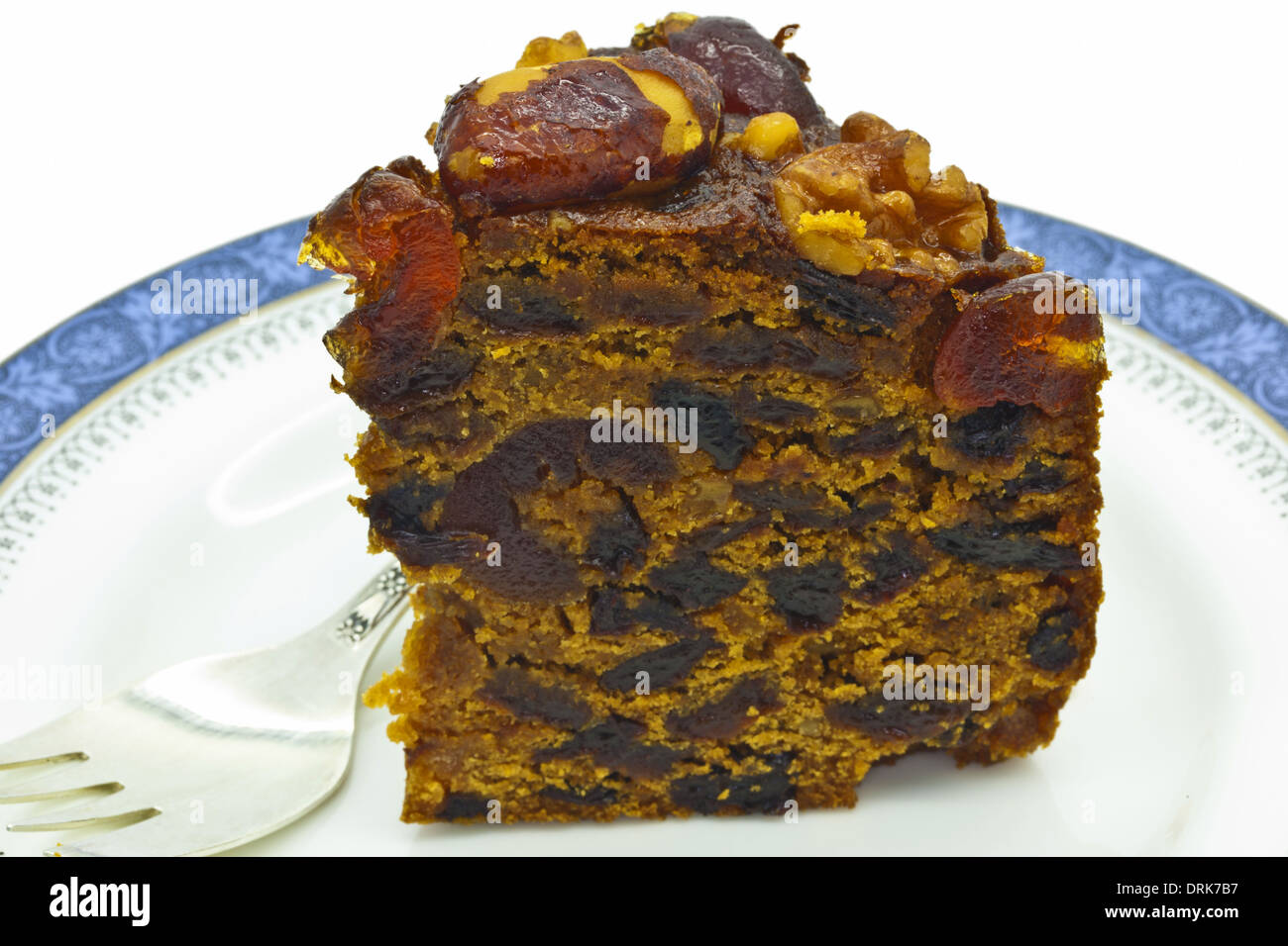 Stück Obstkuchen auf einem Teller mit Kuchengabel. Stockfoto