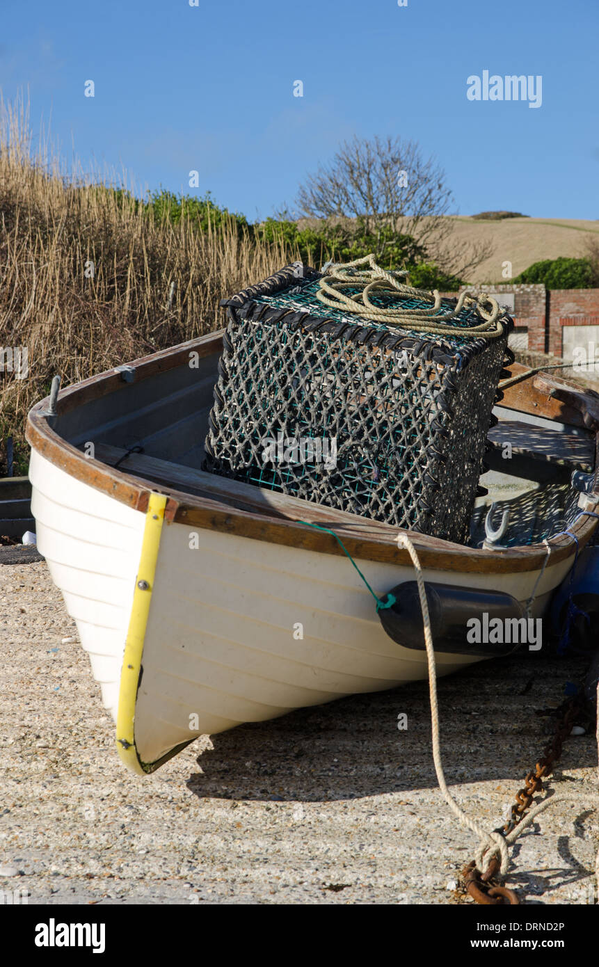 Kleines Fischerboot mit Crab pot Stockfoto