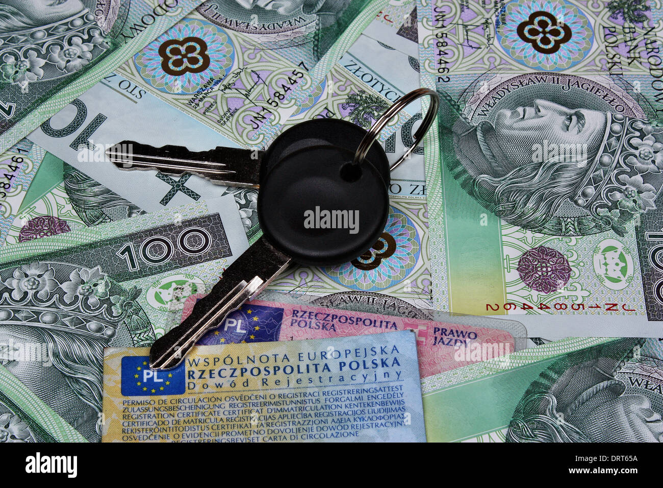 Autoschlüssel und Polnisch Geld Hintergrund Stockfoto