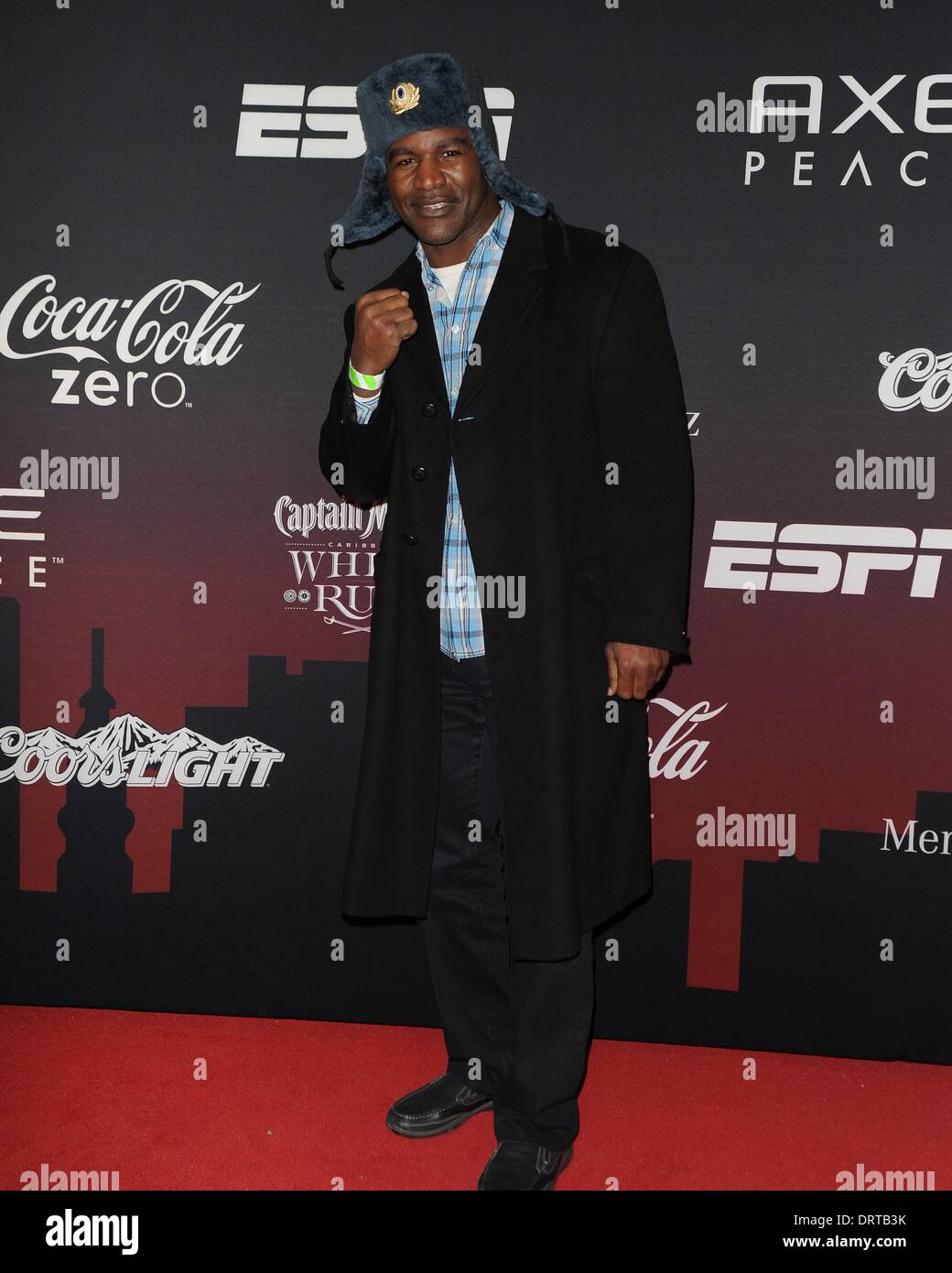 Evander Holyfield im Ankunftsbereich für ESPN Super Bowl Party, Pier 36, New York, NY 31. Januar 2014. Foto von: John Paul Melendez/Everett Collection Stockfoto