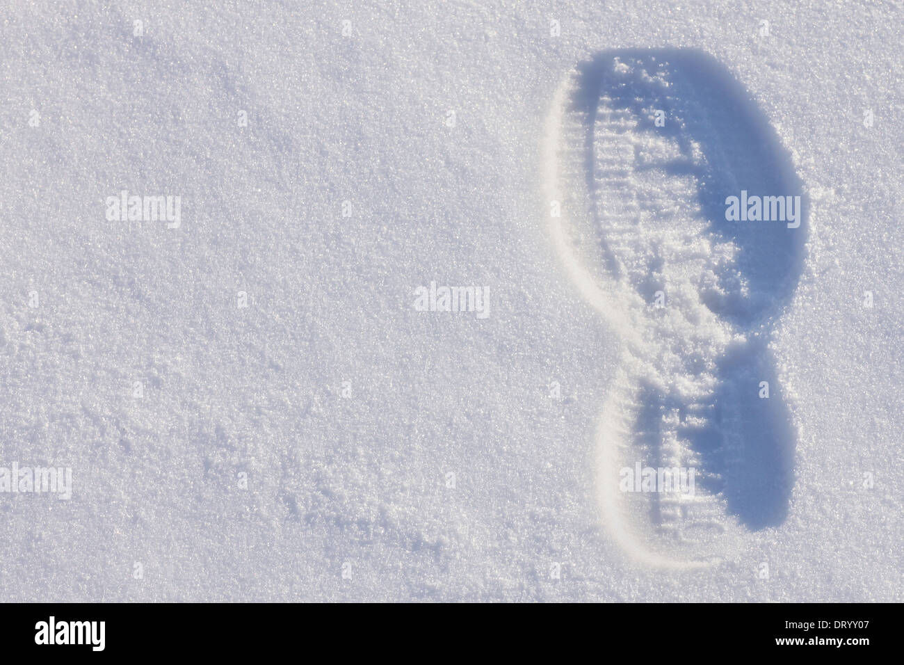 Fußabdruck auf dem Schnee Stockfoto