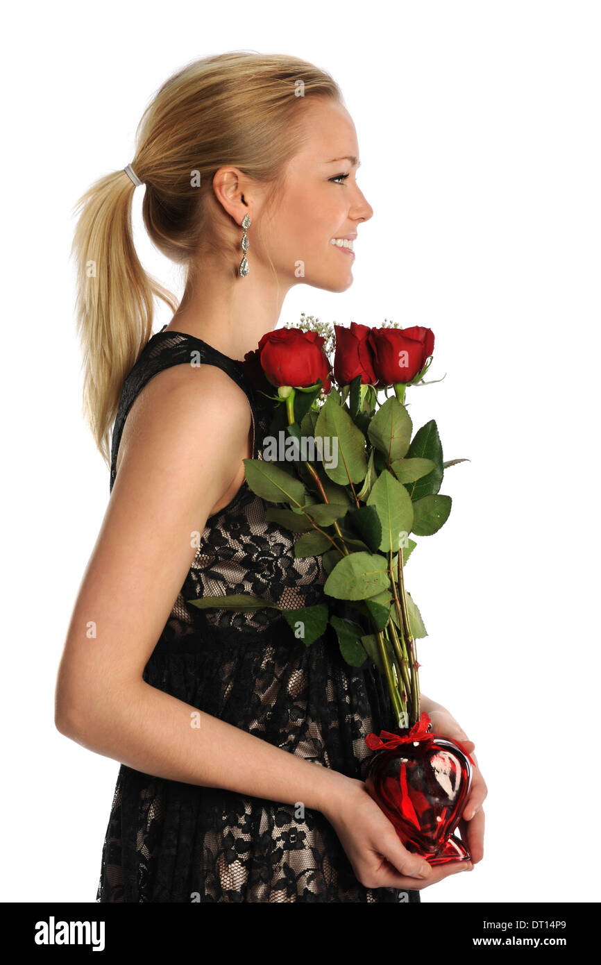 Porträt, schöne junge Frau mit Vase mit Rosen isoliert auf weißem Hintergrund Stockfoto