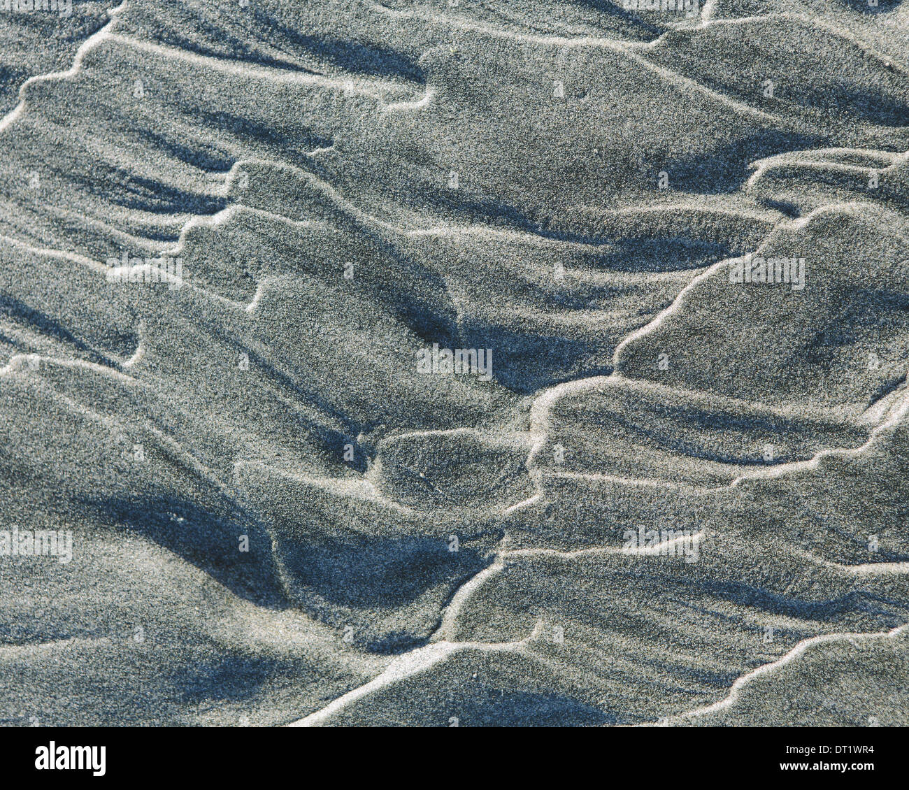 Nahaufnahme von erosive Sand Muster auf Strand und Gezeitenzone Ocean Park Stockfoto
