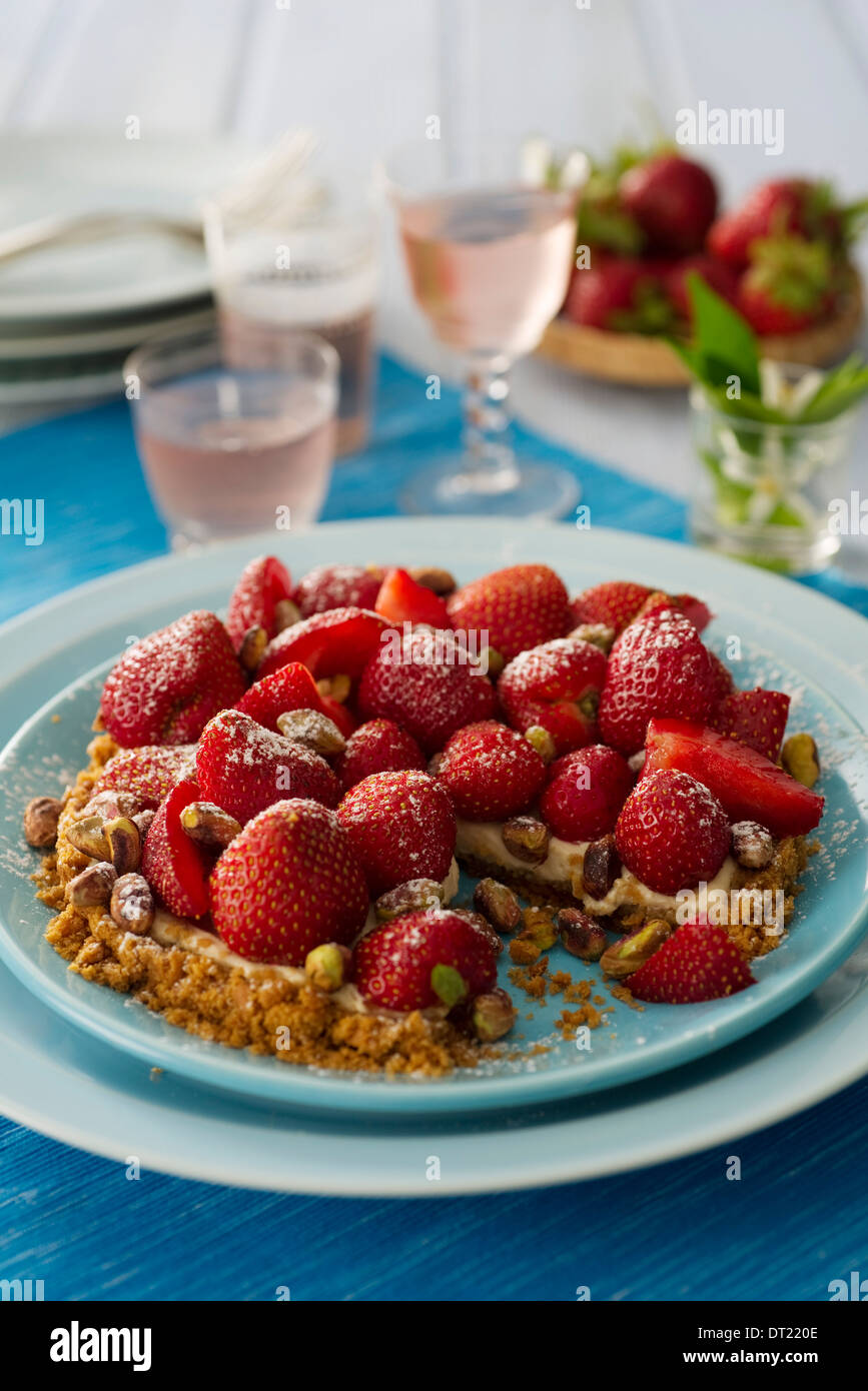 Erdbeeren und Pistazien Kekse Hintergrund Stockfoto