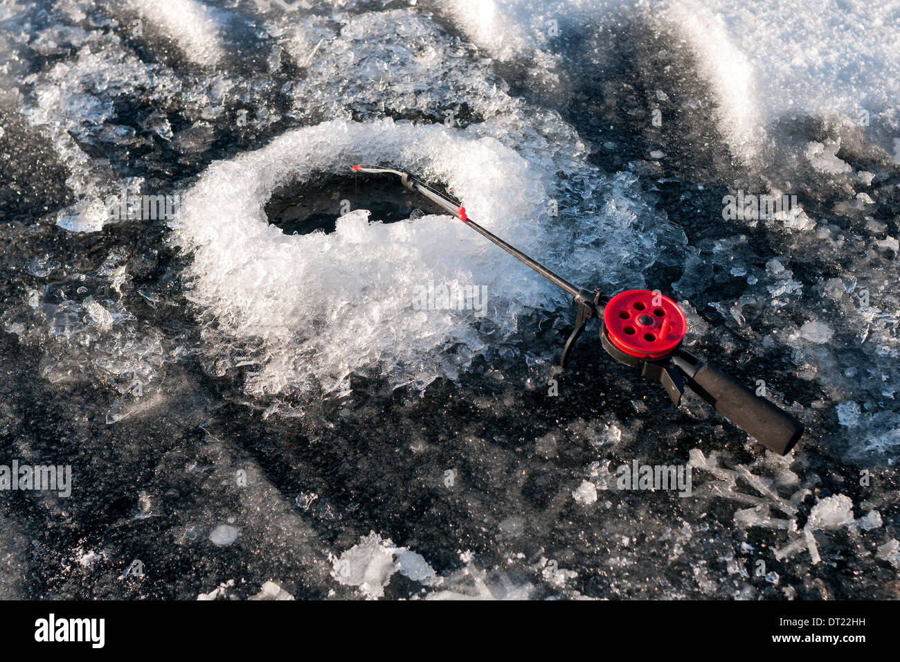 Kleine Winter-Angelrute in das Loch Stockfoto