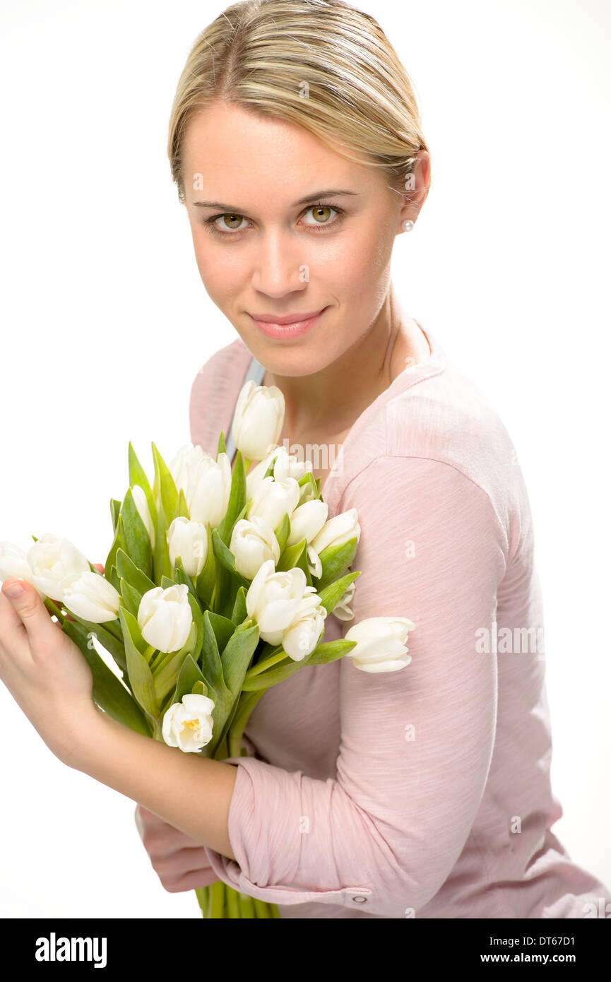 Romantische Frau halten weiße Tulpe Blumenstrauß isoliert Stockfoto