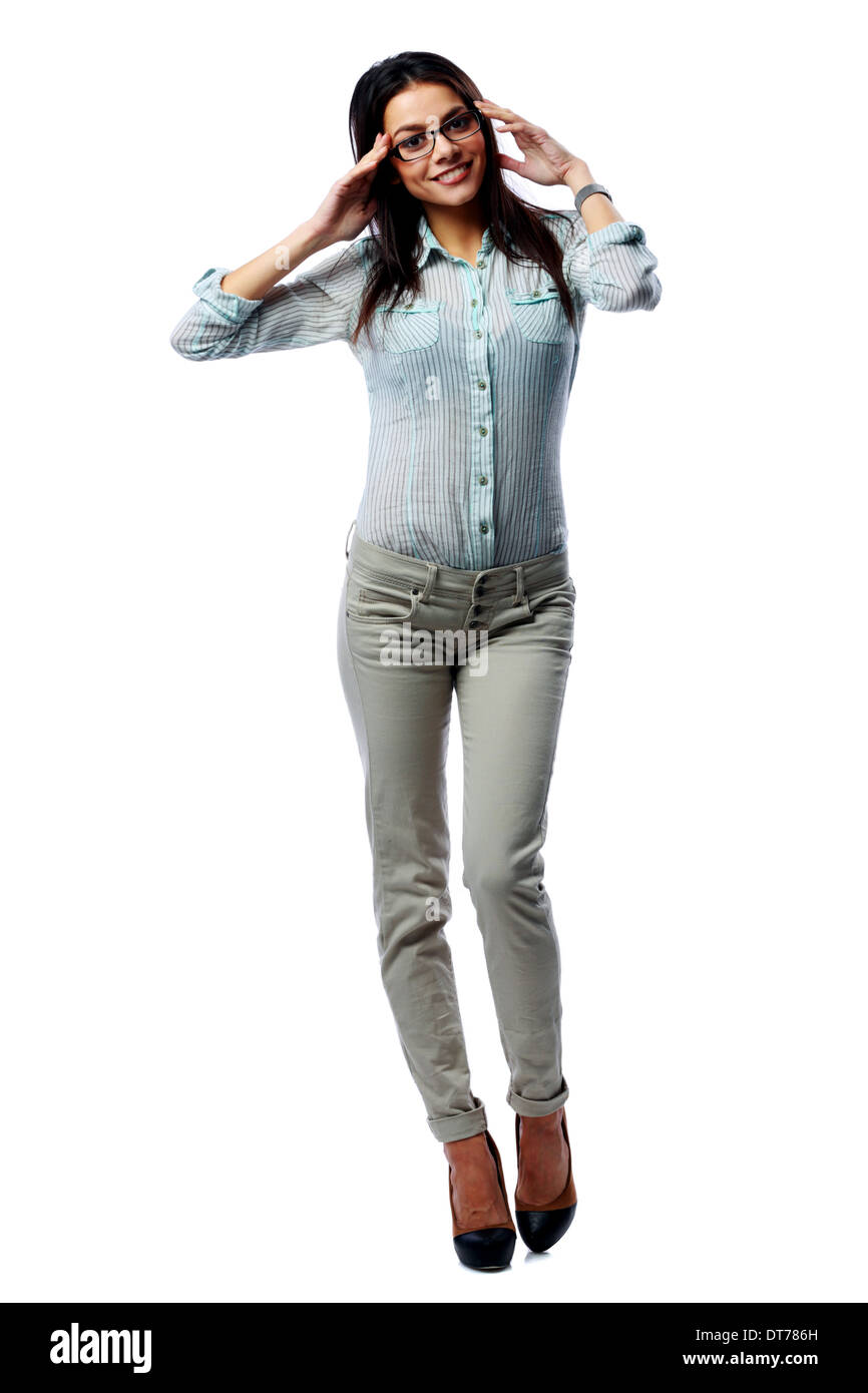 Porträt des jungen lächelnd Geschäftsfrau stehen isoliert auf weißem Hintergrund Stockfoto