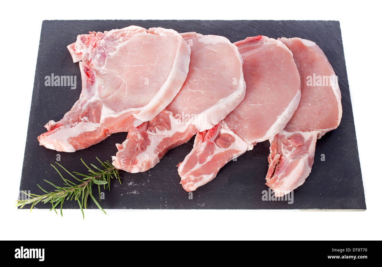 Schweinekoteletts vor weißem Hintergrund Stockfoto