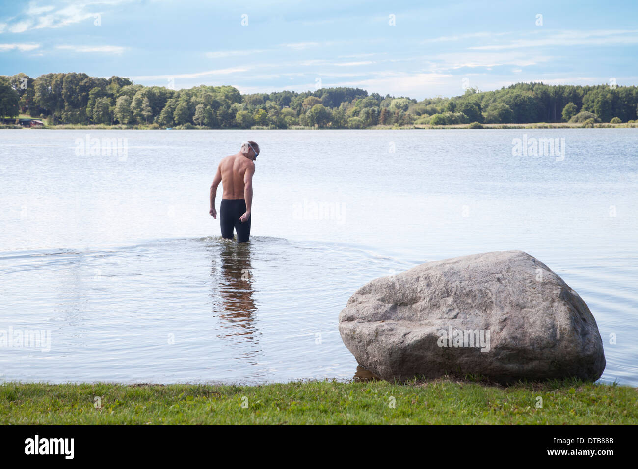 Rückansicht des Menschen im Fluss bei Husum, Germany Stockfoto
