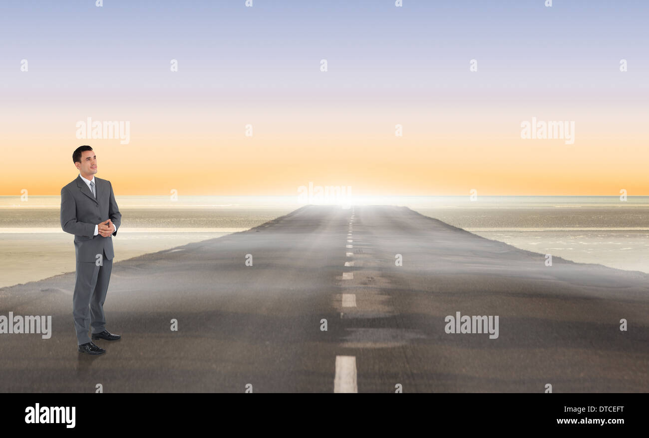 Zusammengesetztes Bild der Geschäftsmann mit gefalteten Händen Stockfoto