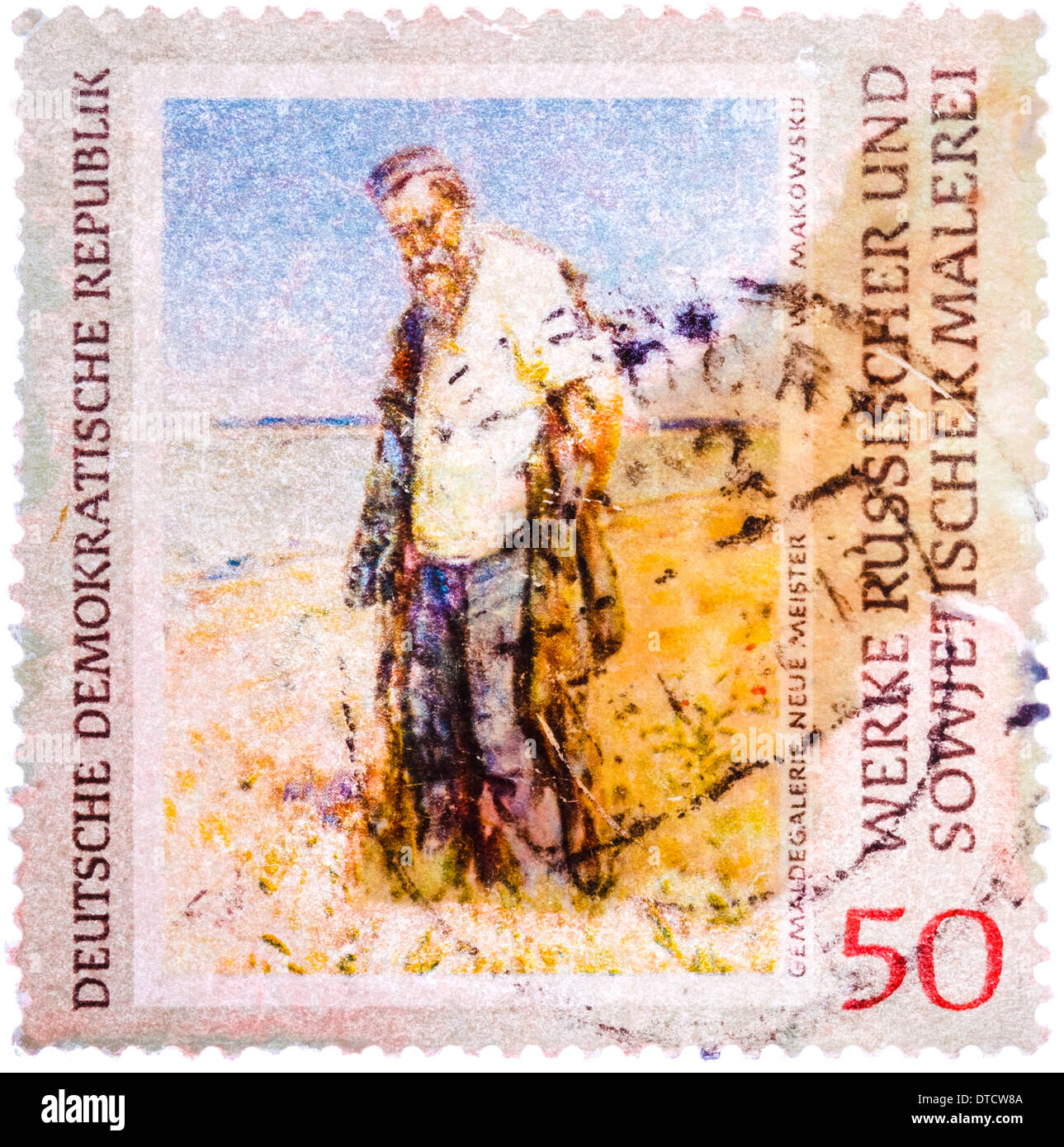 Gedruckt in Deutschland (DDR) Stempel zeigt Bild von Vladimir Makovsky "Mann am Fluss" Stockfoto