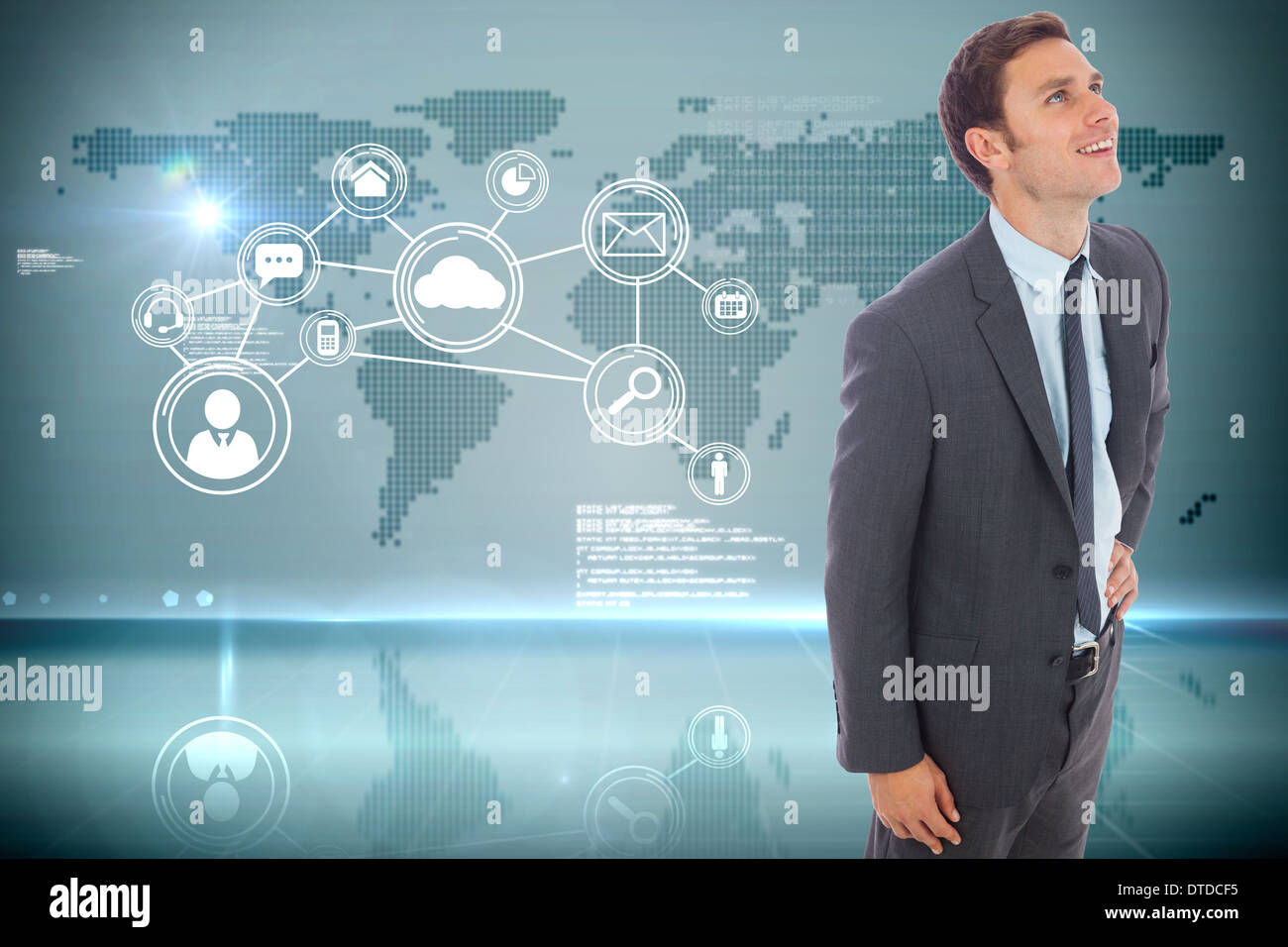 Zusammengesetztes Bild fröhlich Geschäftsmannes stehend mit Hand auf der Hüfte Stockfoto