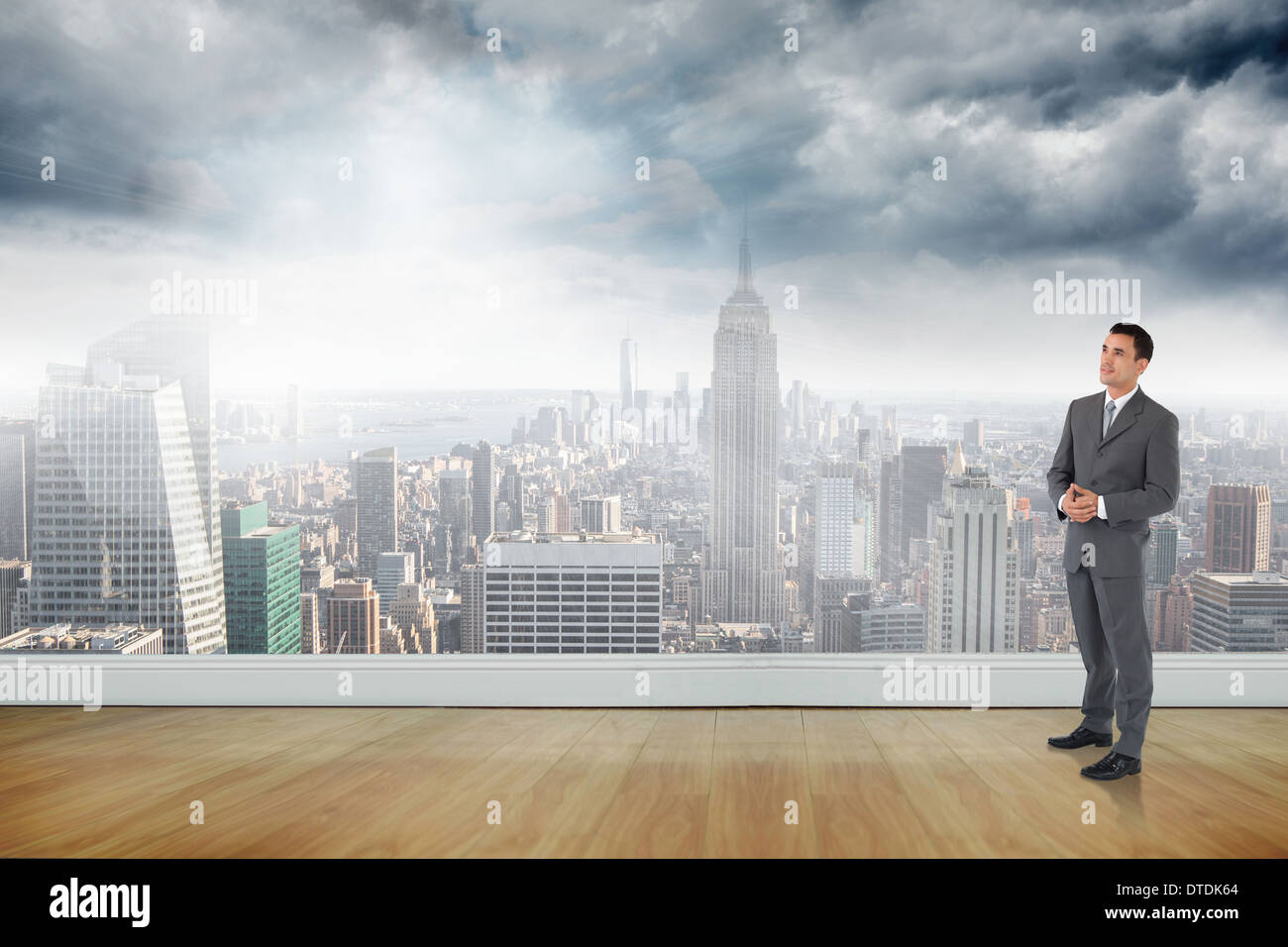 Zusammengesetztes Bild der Geschäftsmann mit gefalteten Händen Stockfoto
