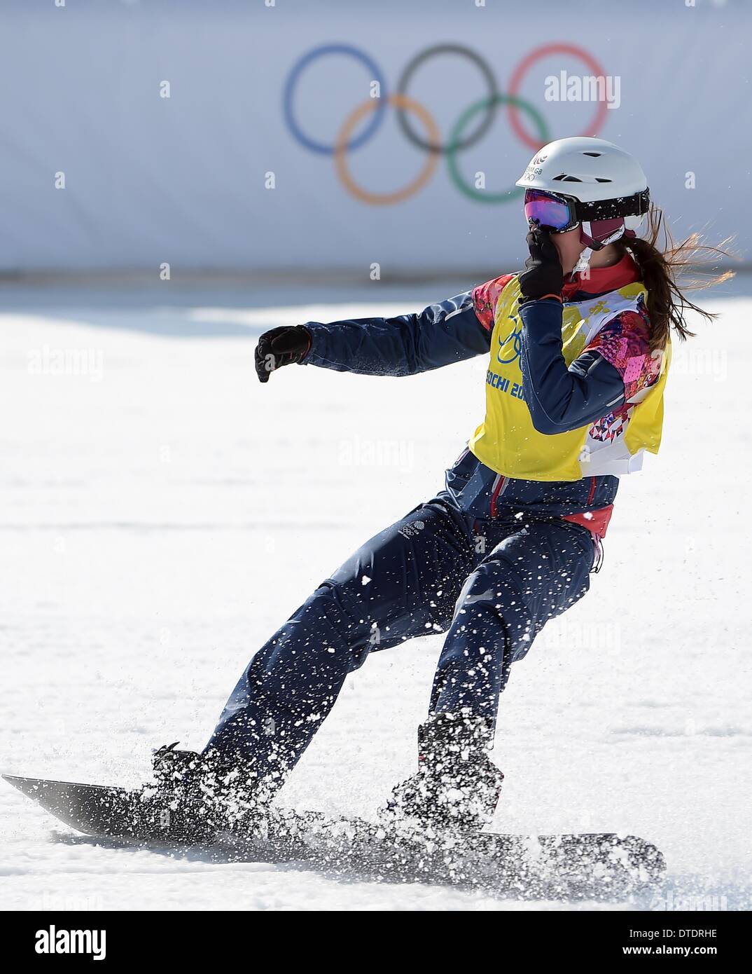 Zoe Gillings (GBR, gelb) erhält 3. Platz im kleinen Finale um 9. insgesamt zu beenden. Womens Snowbboard Cross - Rosa Khutor Extreme Park - Sotschi - Russland - 16.02.2014 Stockfoto