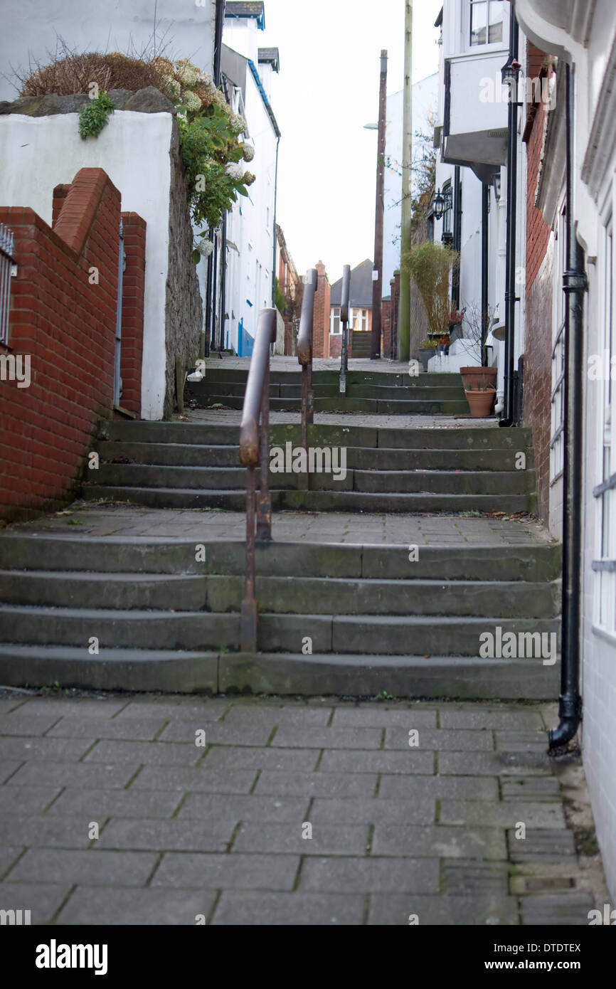 Abgenutzten Stufen und Handlauf in Love Lane, Weymouth. Stockfoto