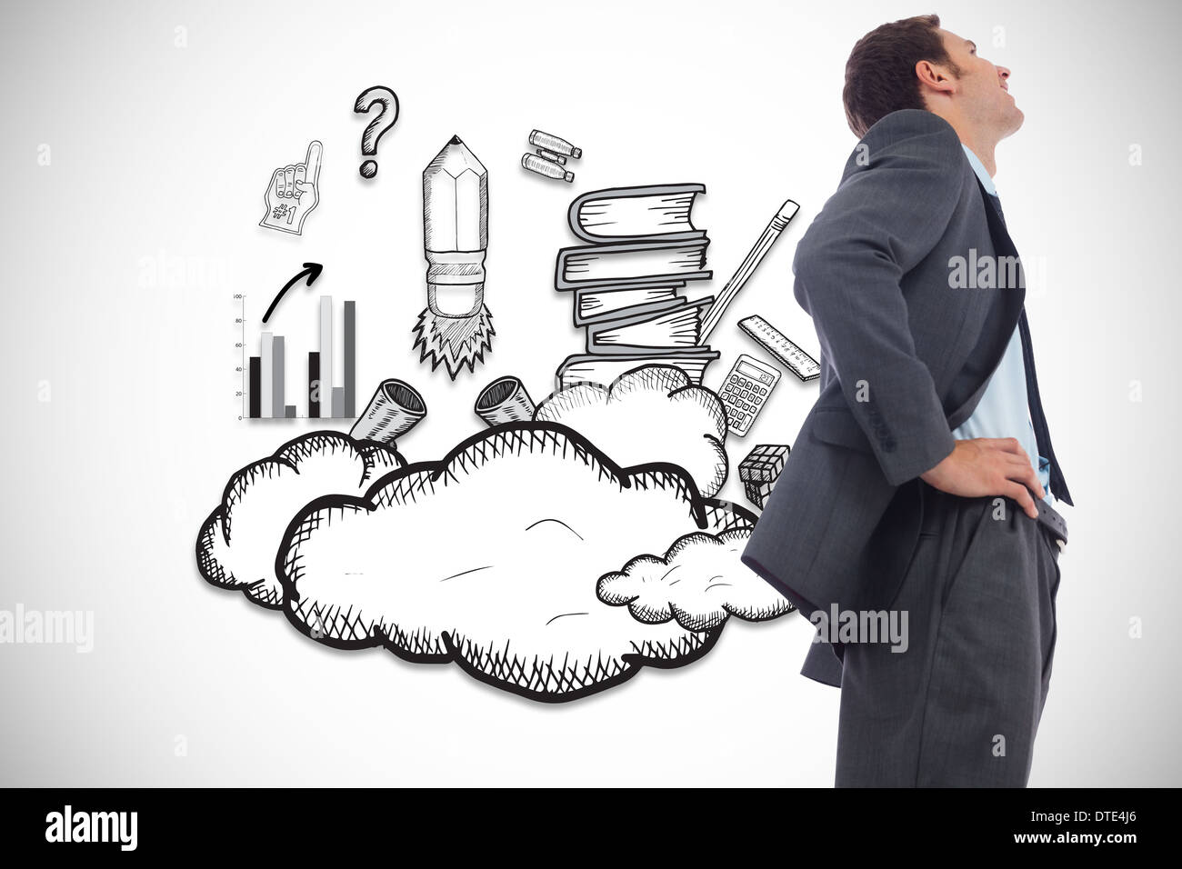 Zusammengesetztes Bild von fröhlich Geschäftsmann stehend mit Händen auf den Hüften Stockfoto