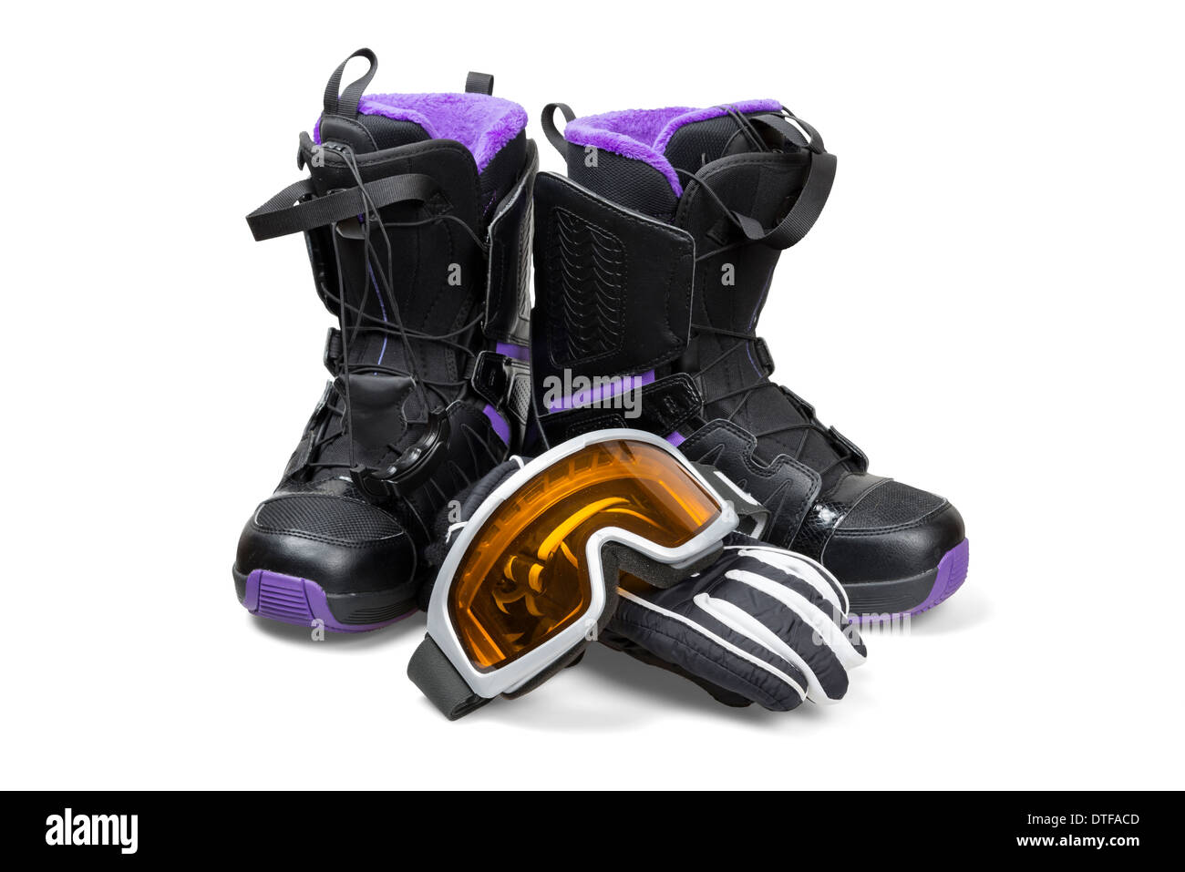 Snowboard-Stiefel, Handschuhe und Schutzbrillen Stockfoto