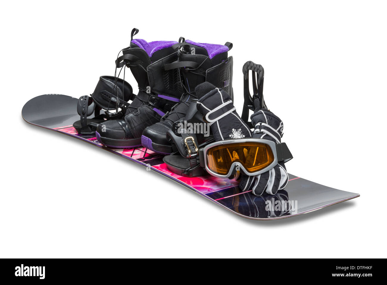 Snowboard mit Stiefel, Handschuhe und Schutzbrillen Stockfoto
