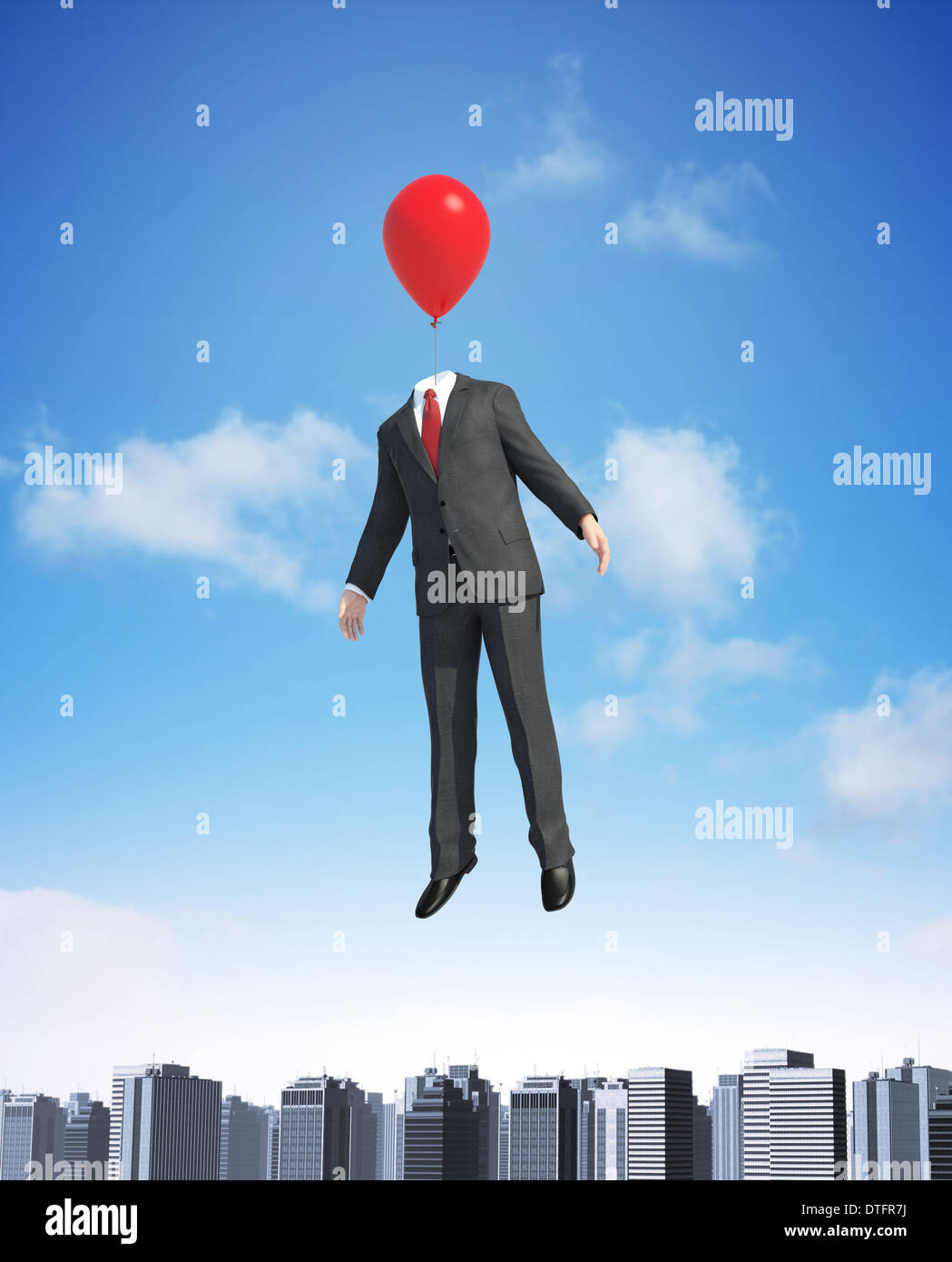 Mann mit einem Ballon schwebt über einer Stadt Stockfoto