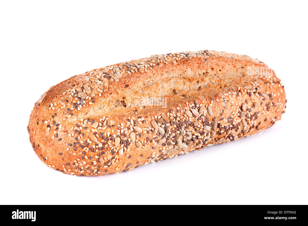 Laib Brot mit Samen isoliert auf weiss Stockfoto