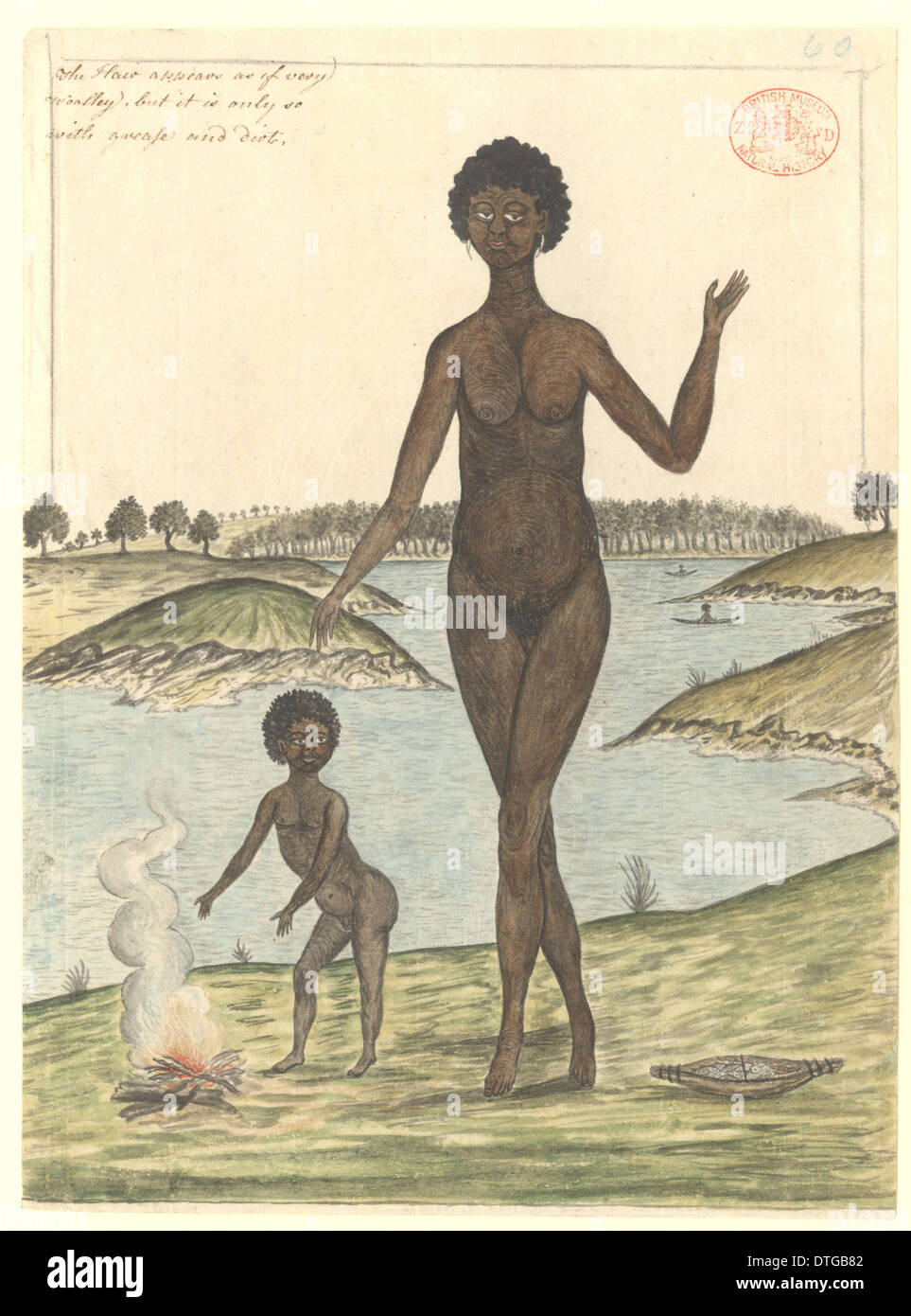 Aborigine-Frau und Kind durch einen Brand Stockfoto