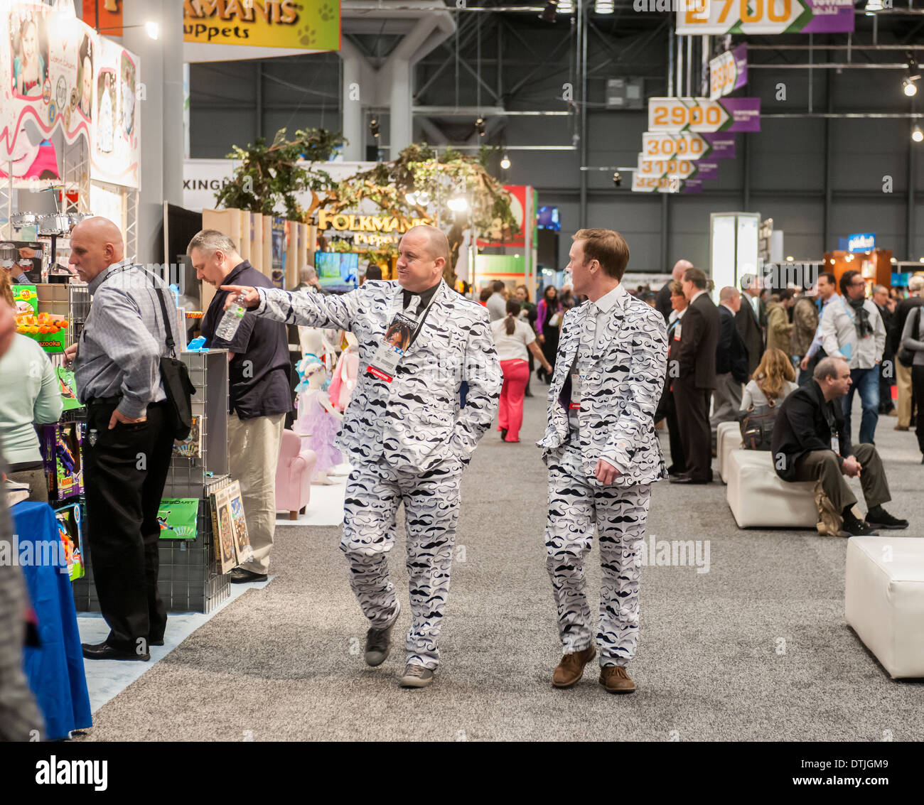 Aussteller, die Förderung von "StacheTats" temporäre Tattoos auf der American International Toy Fair Stockfoto