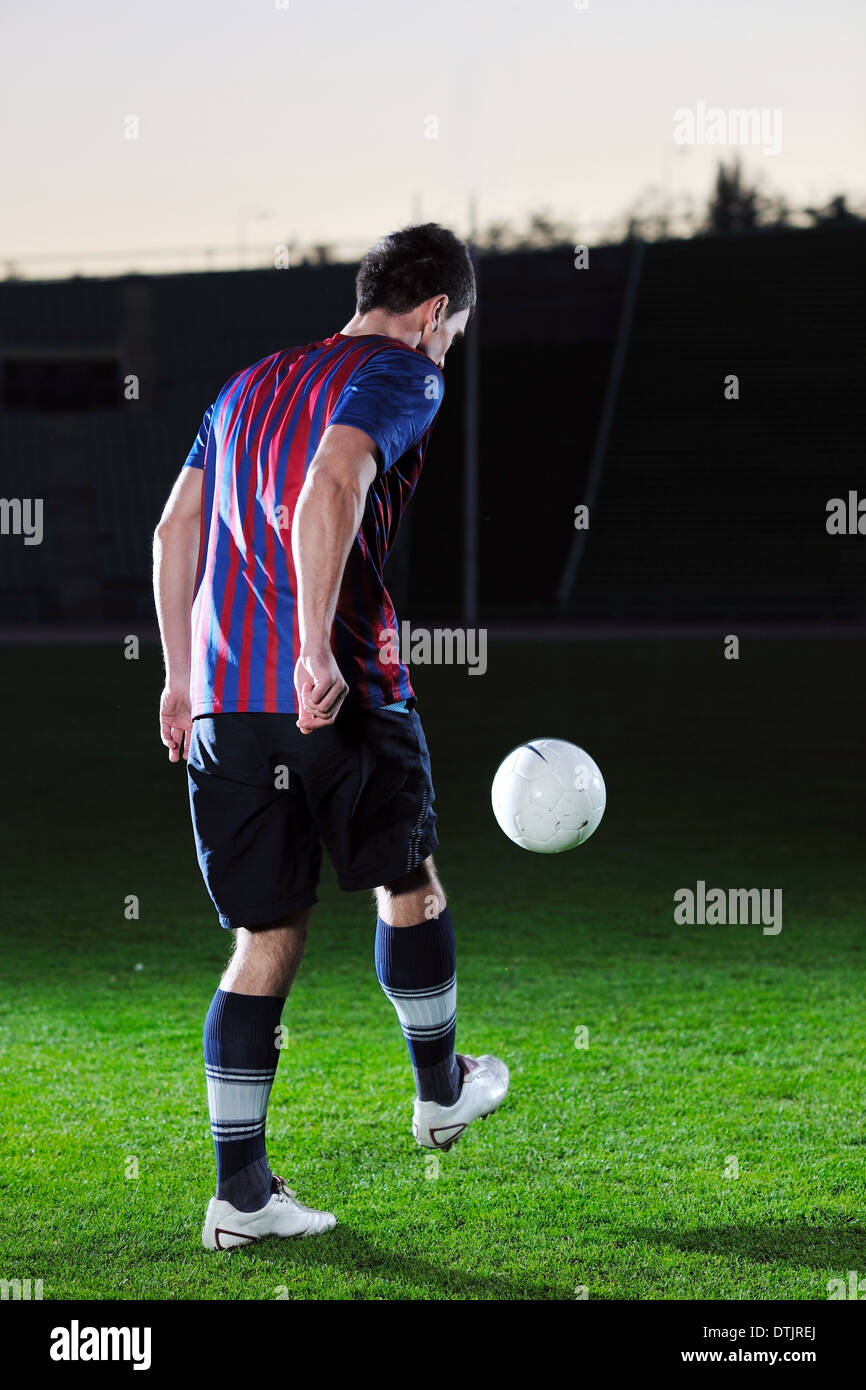 Football-Spieler in Aktion Stockfoto