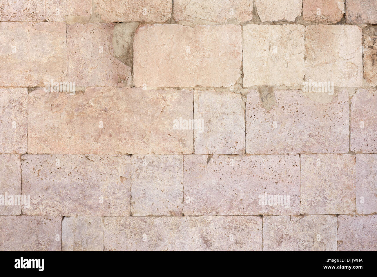 Alten römischen Steinmauer Textur Hintergrund Stockfoto