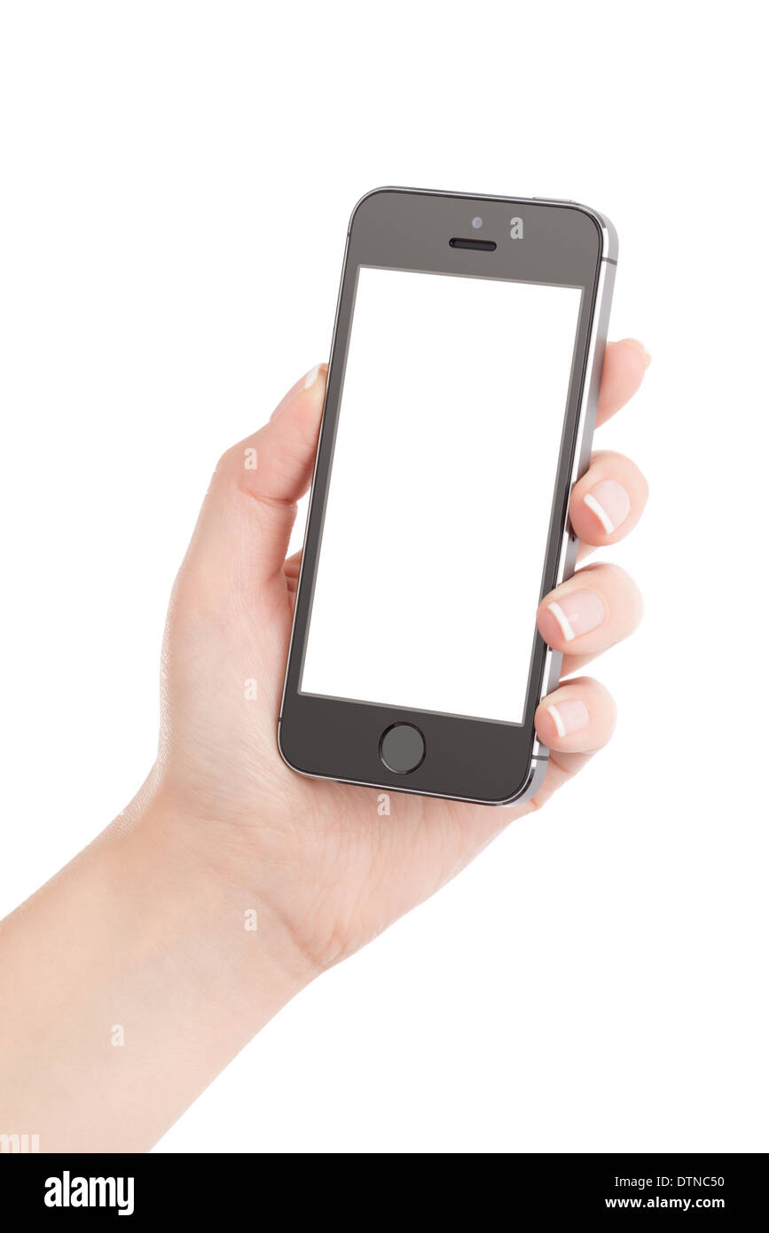 Weibliche Hand mit modernen schwarzen mobile Smartphone mit unbelegten Schirm isoliert auf weißem Hintergrund. Hohe Qualität. Stockfoto