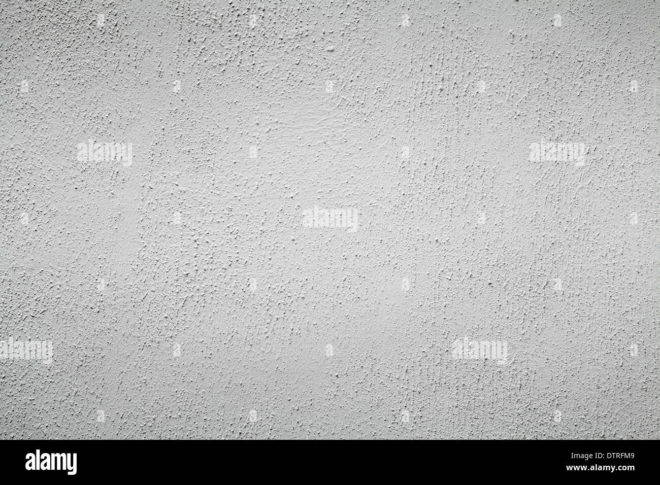 Hintergrundtextur graue Betonwand mit Stuck Stockfoto
