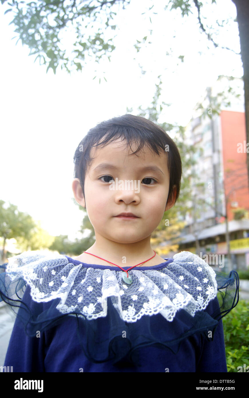 Das kleine Mädchen in der chinesischen Stockfoto