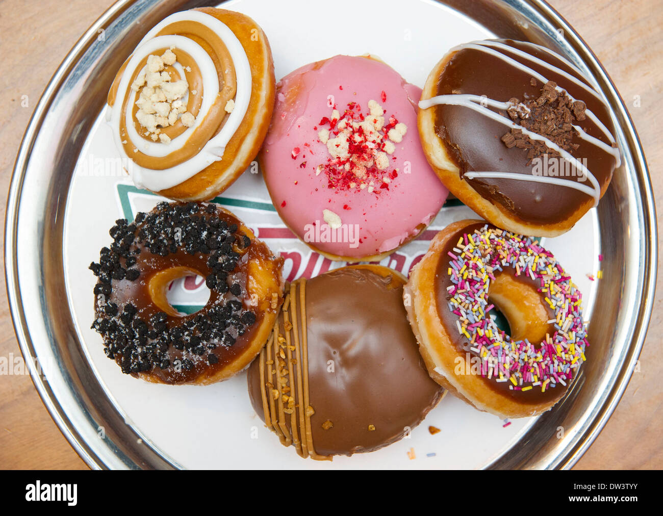 Eine Auswahl Krispy Kreme Doughnuts. Stockfoto