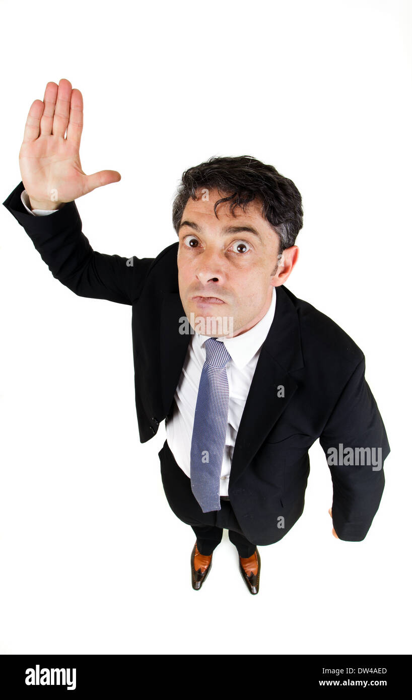 Strenge Geschäftsmann bedrohlich mit seinen Händen isoliert auf weißem Hintergrund Stockfoto