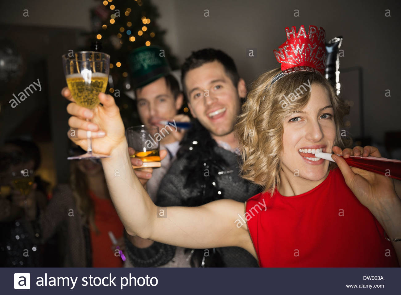 Porträt von Freunden genießen New Years Eve party Stockfoto
