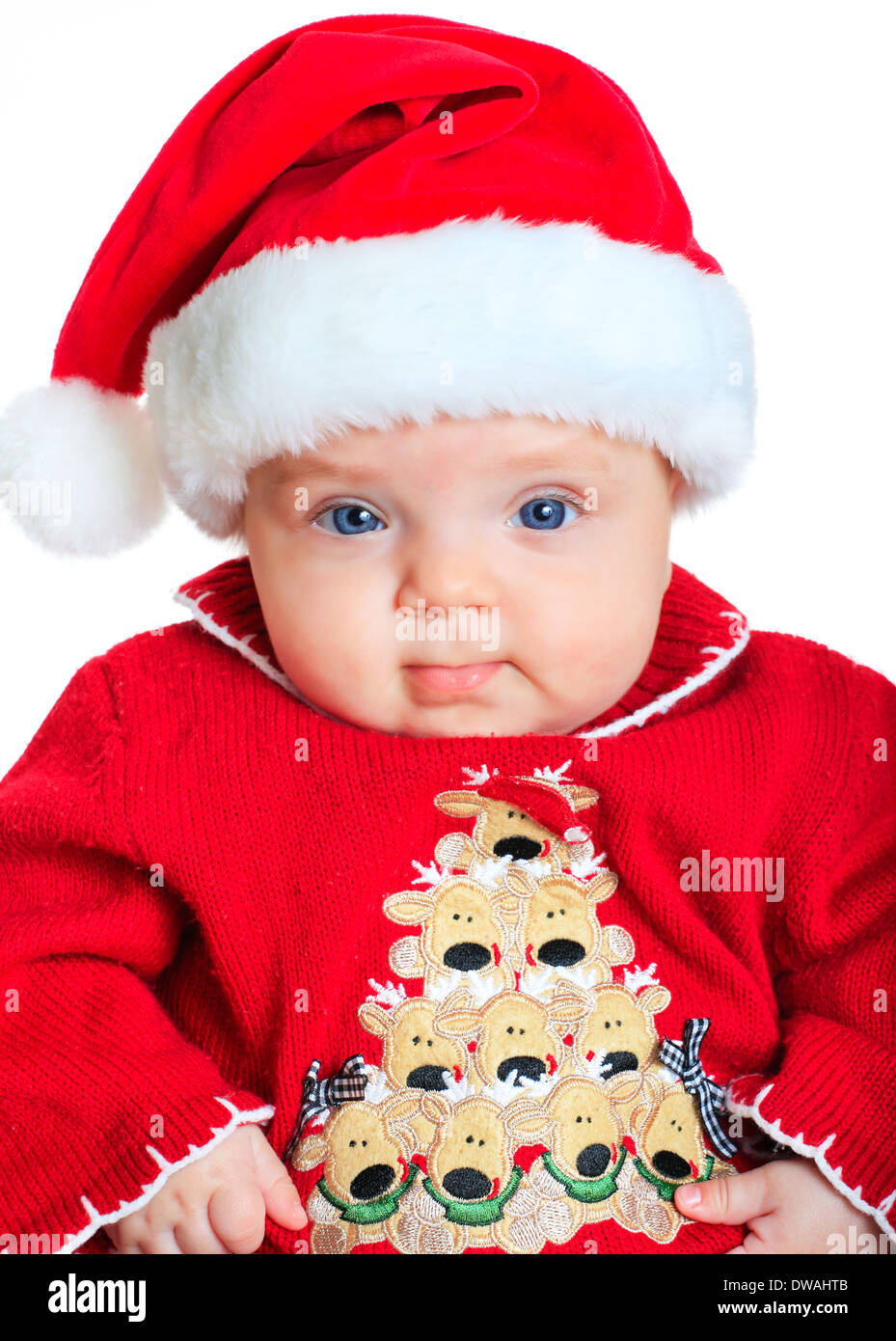 Babymädchen trägt einen Weihnachtsmann Anzug und Hut Stockfoto