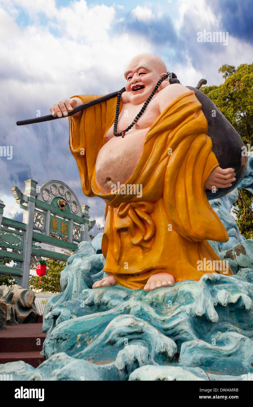 Singapur - 1. Februar 2014: Ho Tai Laughing Buddha-Statue von Tor im Themenpark Haw Par Villa. Stockfoto