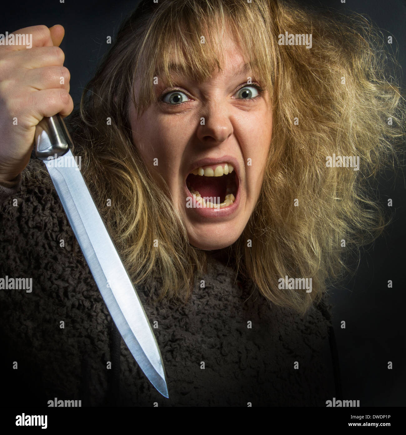 Psychotischen junge Frau - häusliche Gewalt Stockfoto