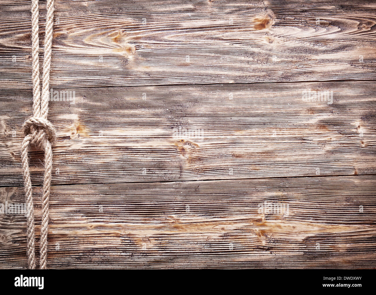 Seemanns Knoten über alten hölzernen Hintergrund. Stockfoto