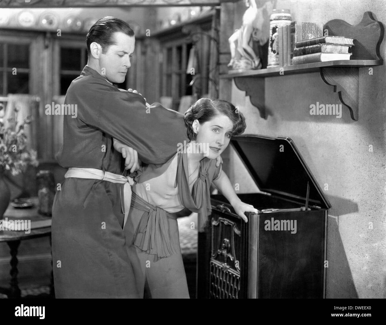 Robert Montgomery und Norma Shearer, am Set des Films, "Private Lives" unter der Regie von Sidney Franklin, 1931 Stockfoto