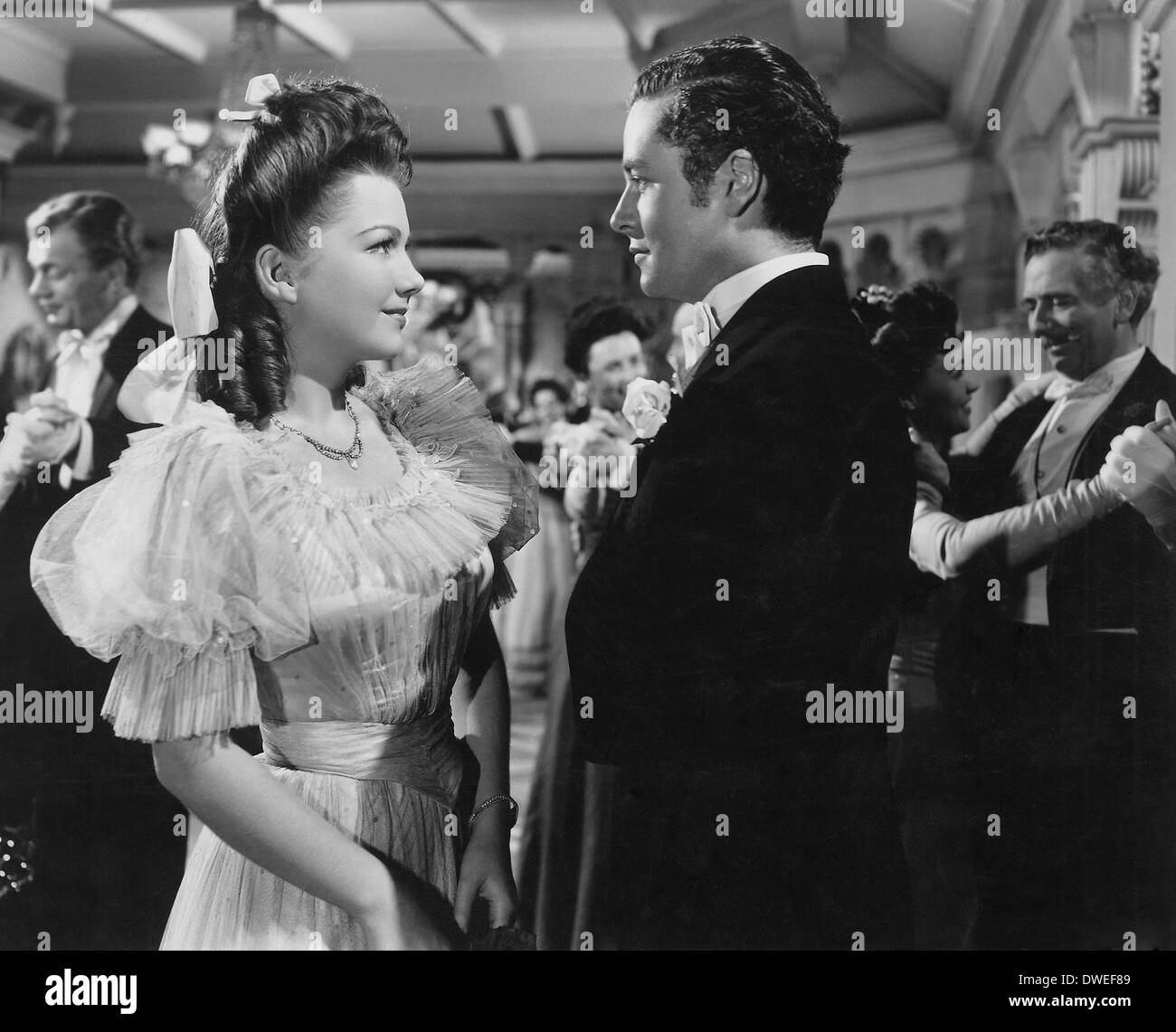 Joseph Cotten, Anne Baxter, Tim Holt und Ray Collins am Set des Films, "The Magnificent Ambersons" unter der Regie von Orson Welles, 1942 Stockfoto