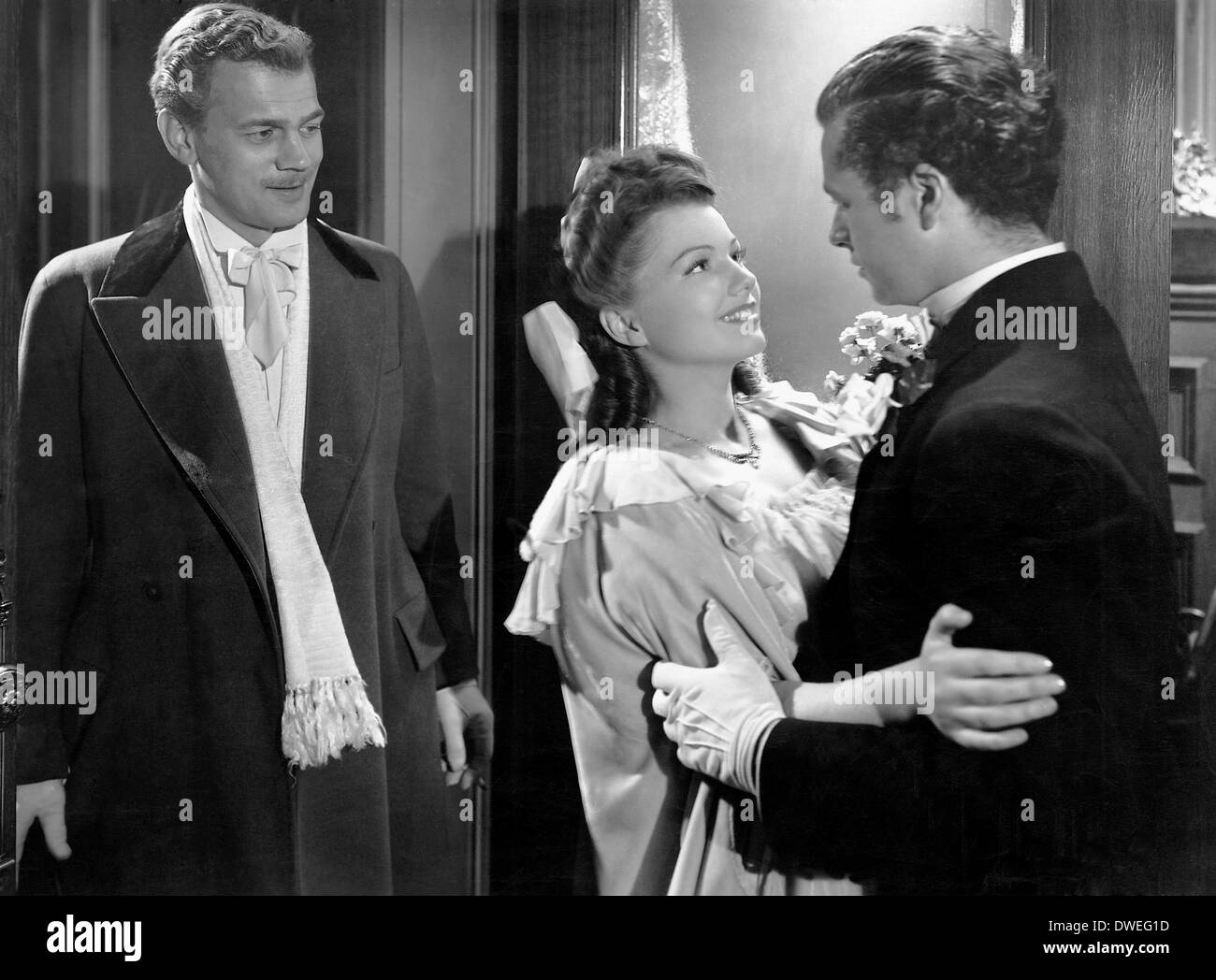 Joseph Cotten, Anne Baxter und Tim Holt, am Set des Films, "The Magnificent Ambersons" unter der Regie von Orson Welles, 1942 Stockfoto