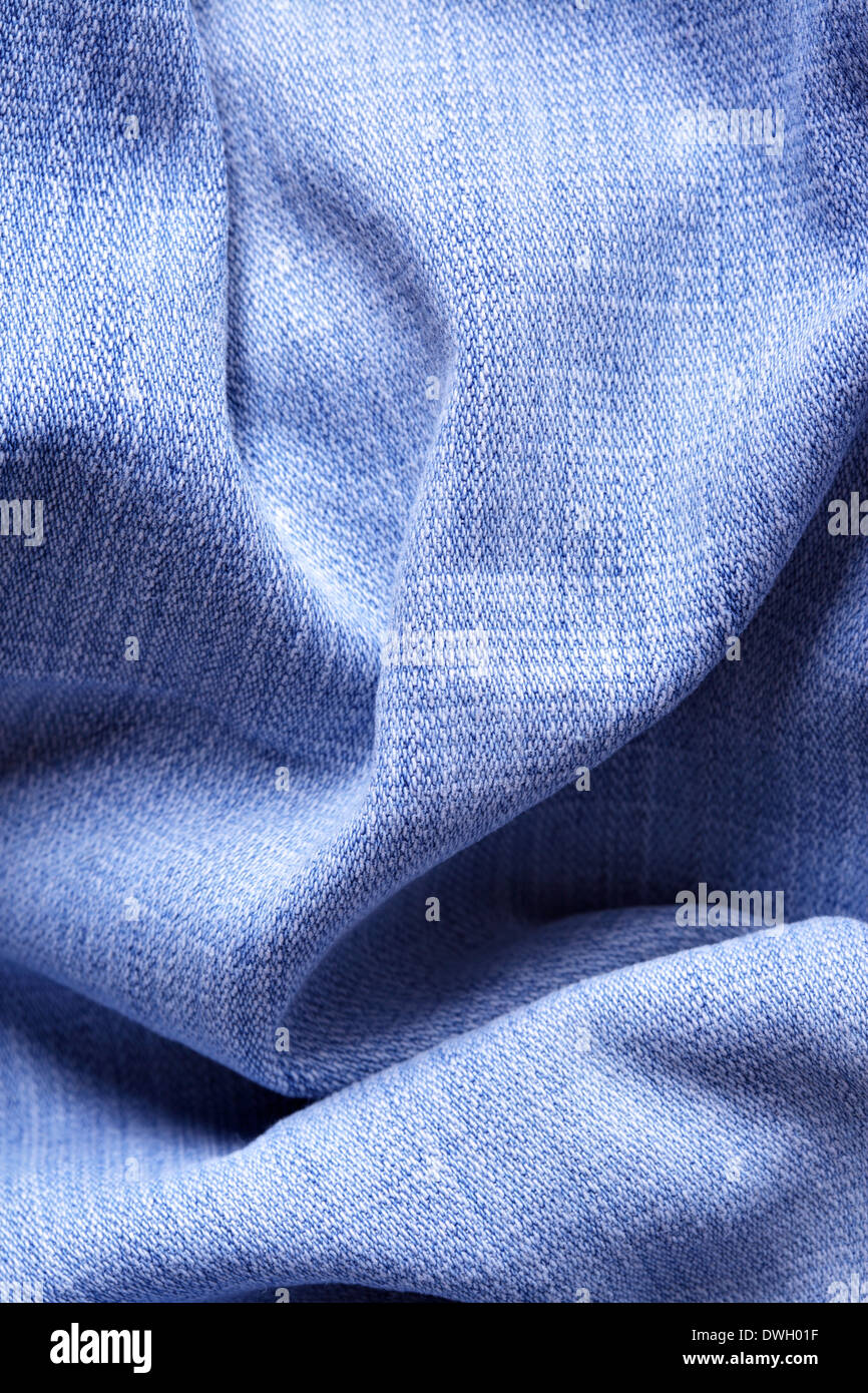 Jeans-Stoff mit Falten, werden als Hintergrund verwendet Stockfoto