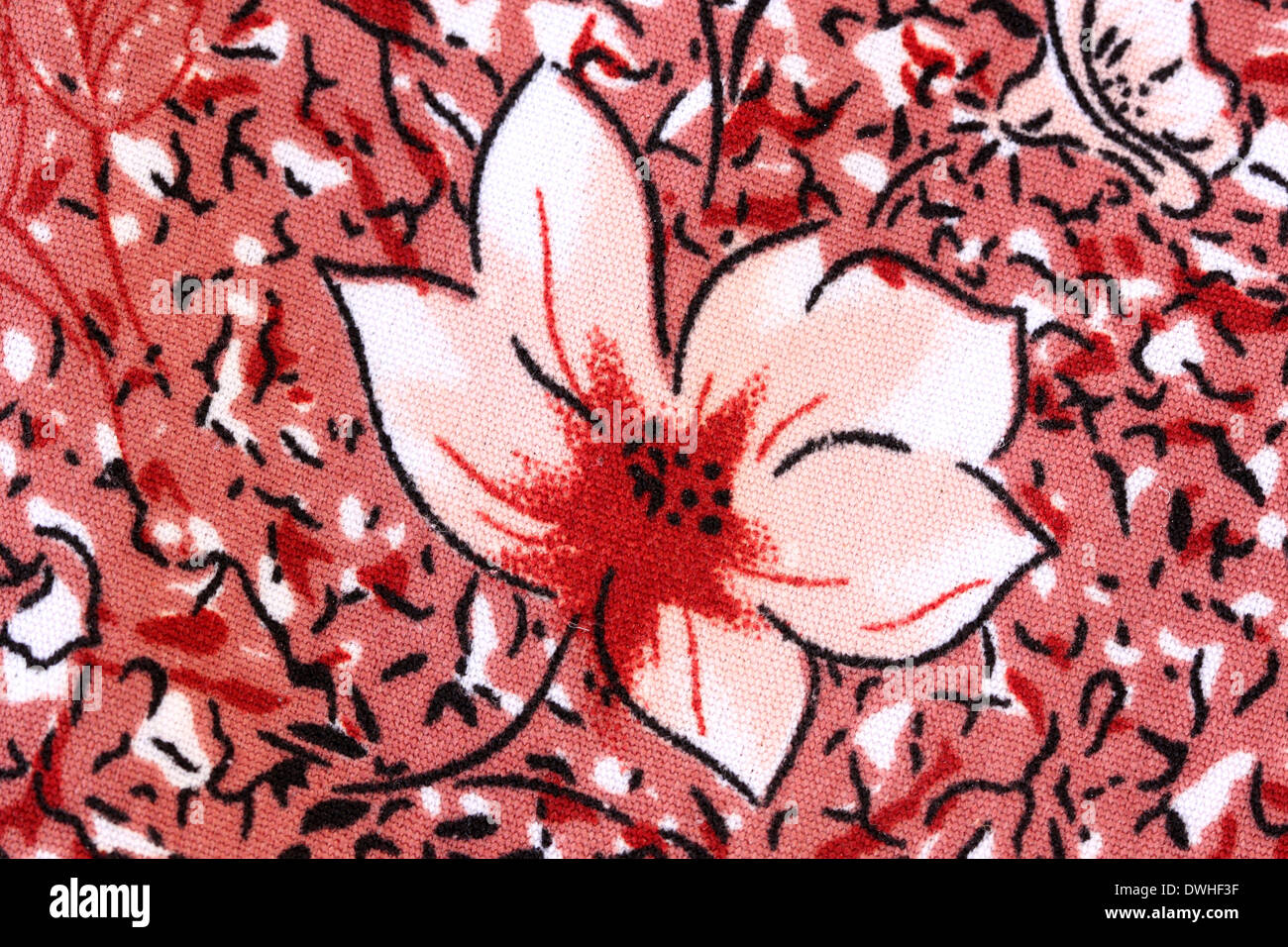 Design der roten Blumenmuster auf Stoff für den Hintergrund. Stockfoto